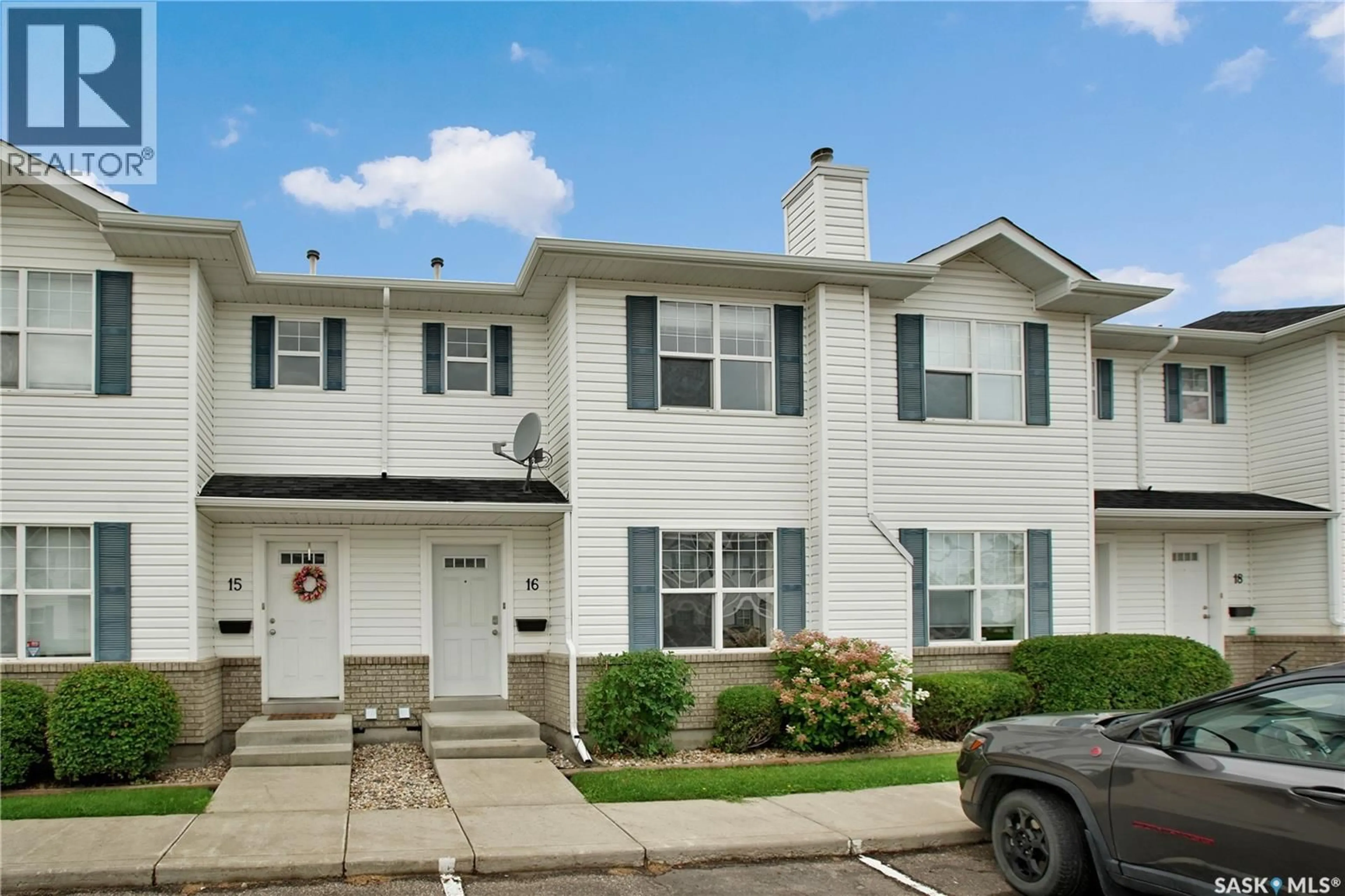 Home with vinyl exterior material, street for 16 203 HEROLD TERRACE, Saskatoon Saskatchewan S7V1H4