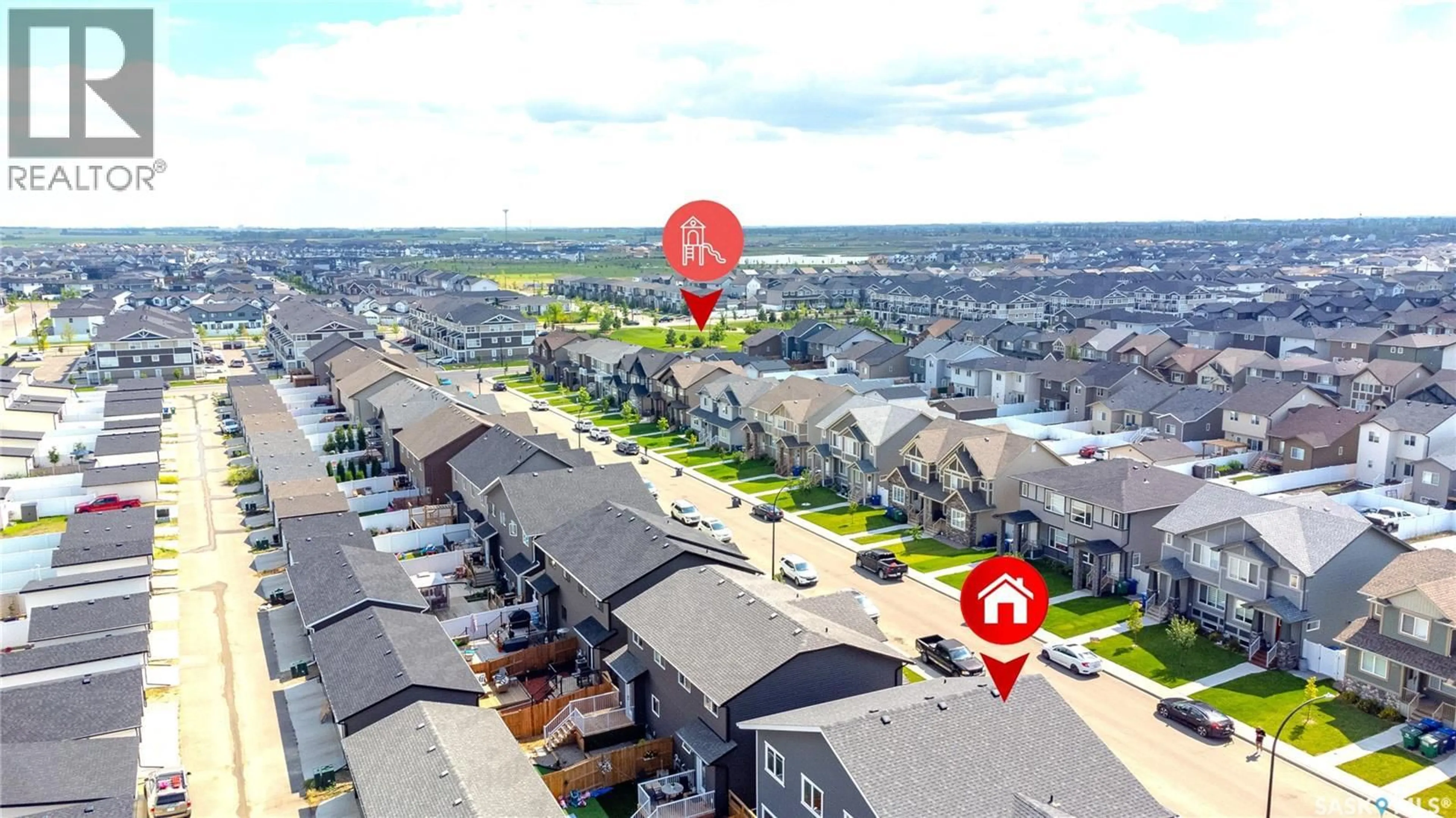A pic from outside/outdoor area/front of a property/back of a property/a pic from drone, street for 891 MCFAULL RISE, Saskatoon Saskatchewan S7V0S9