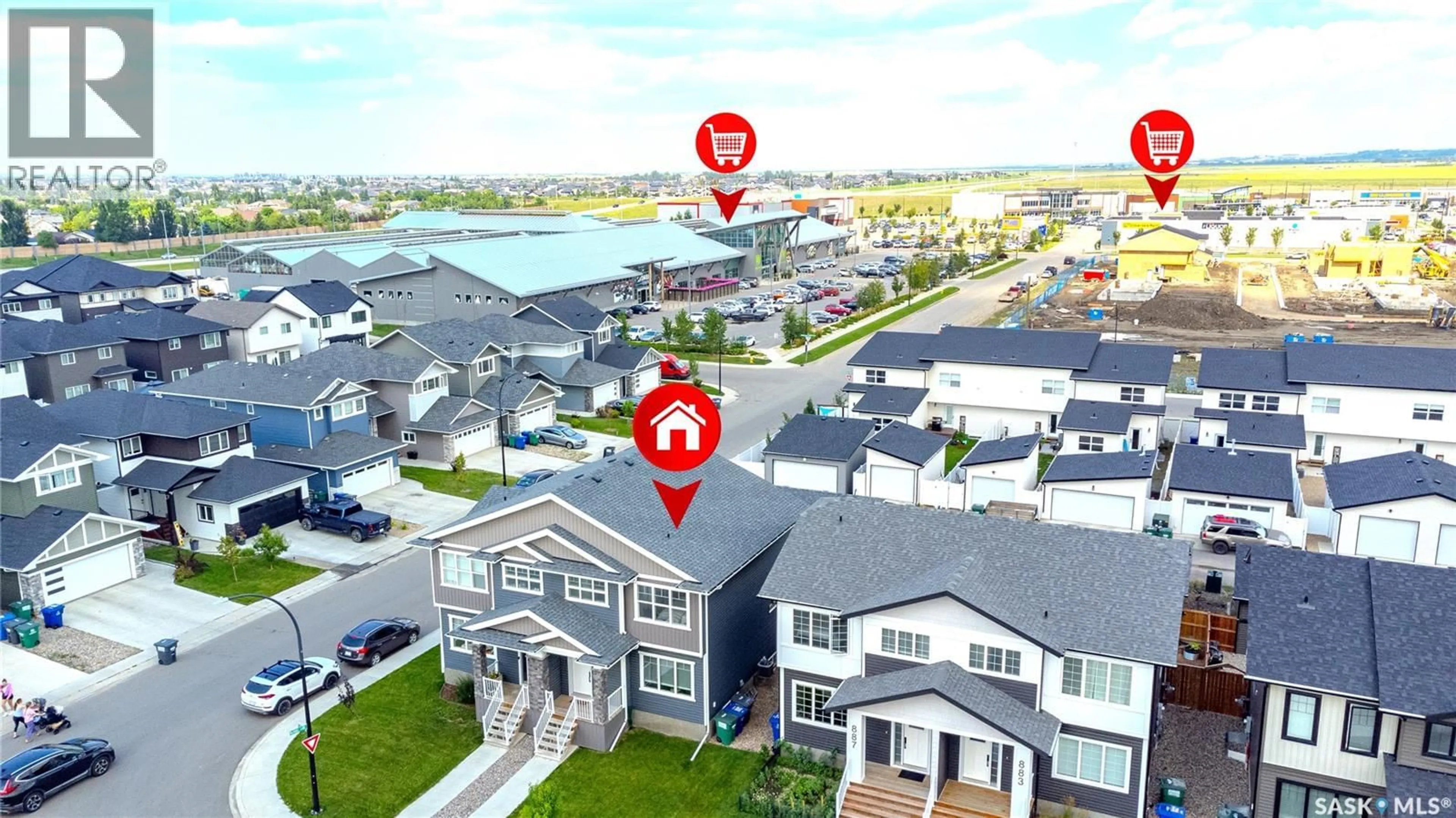 A pic from outside/outdoor area/front of a property/back of a property/a pic from drone, street for 891 MCFAULL RISE, Saskatoon Saskatchewan S7V0S9