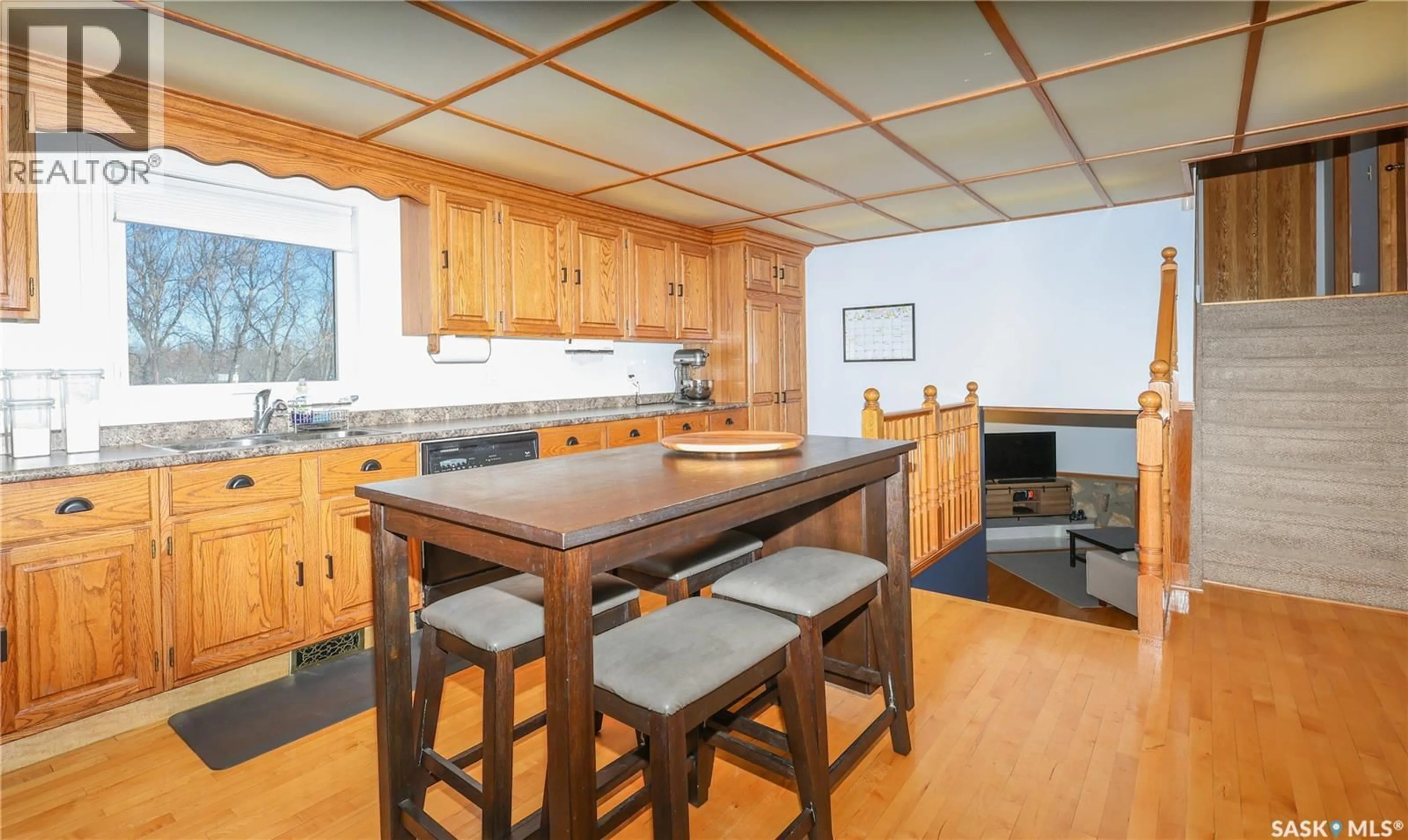 Open concept kitchen, wood/laminate floor for MACDONALD ROAD, Prince Albert Rm No. 461 Saskatchewan S6V5R1