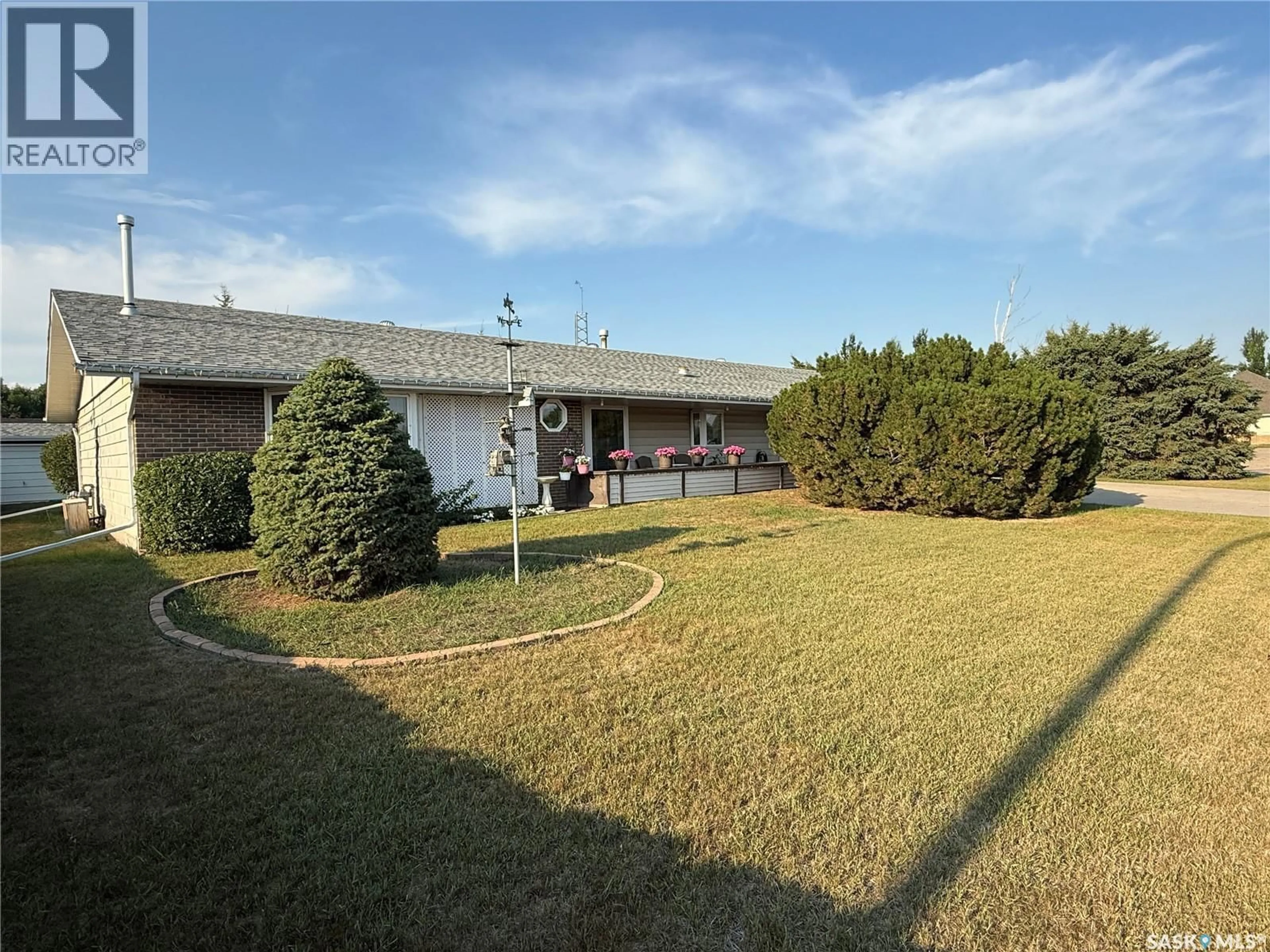 A pic from outside/outdoor area/front of a property/back of a property/a pic from drone, unknown for 701 ADAMSON CRESCENT, Shellbrook Saskatchewan S0J2E0