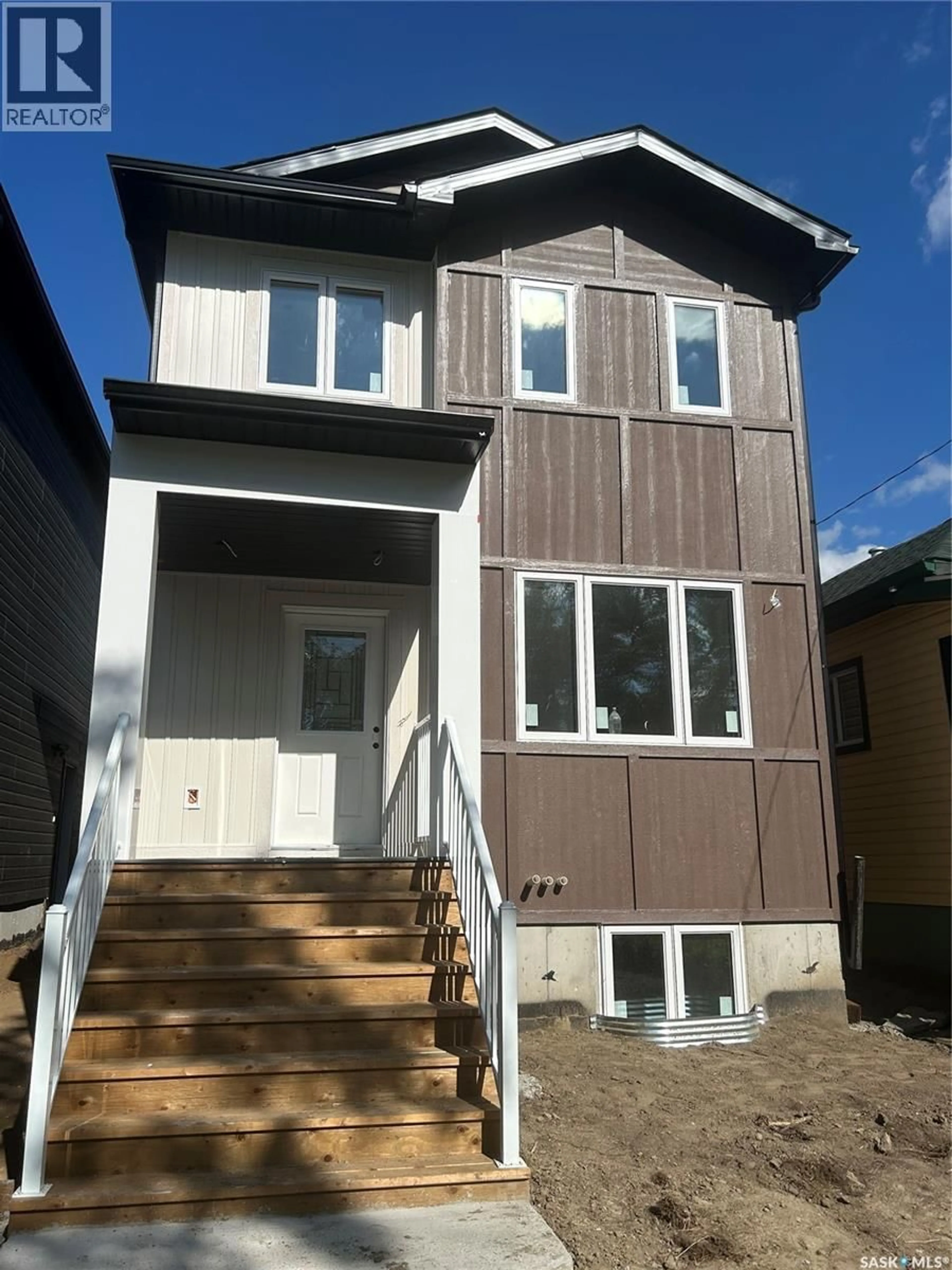Home with vinyl exterior material, street for 534 K AVENUE, Saskatoon Saskatchewan S7L2M7
