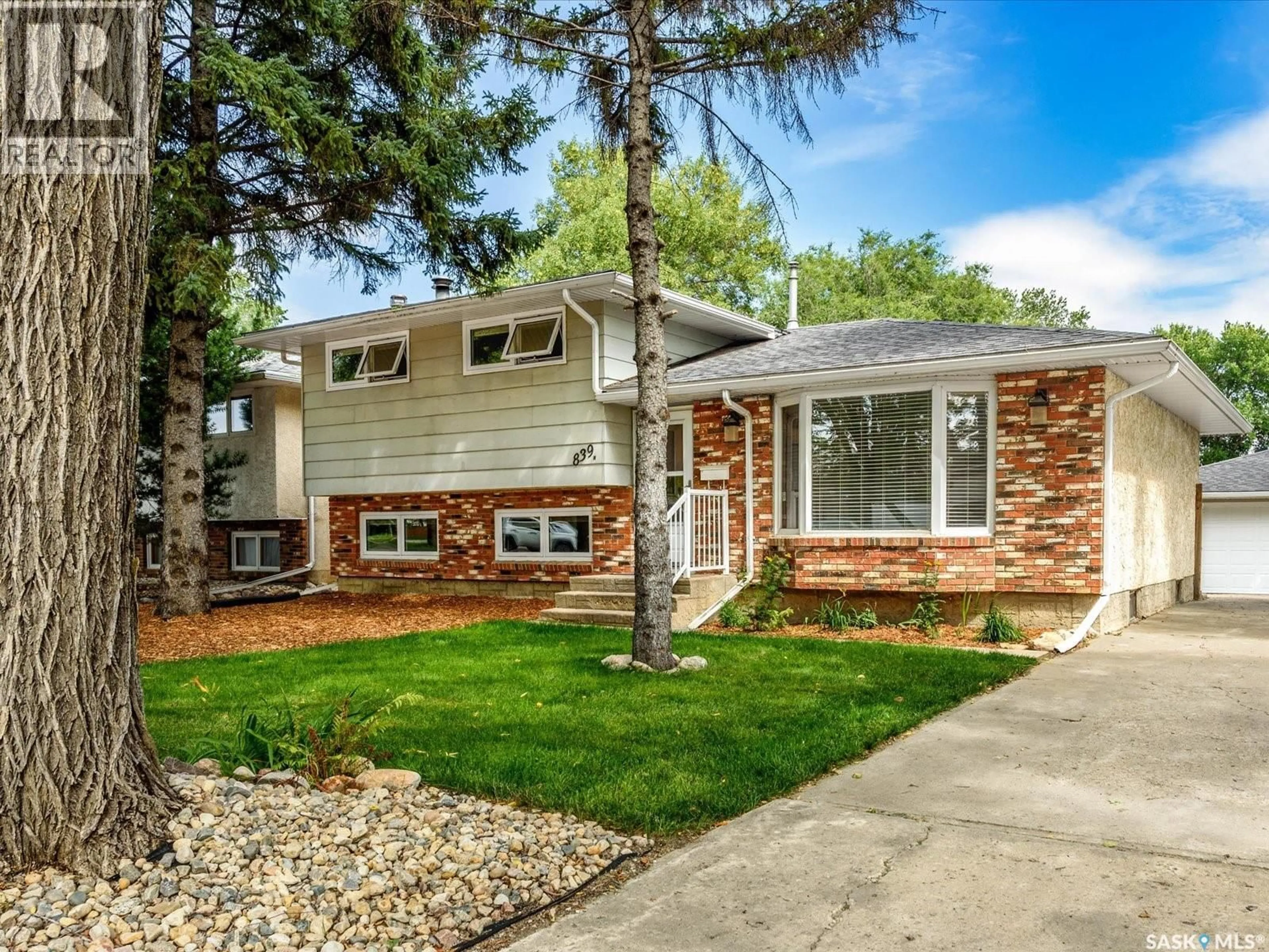 Home with vinyl exterior material, street for 839 MCINTOSH STREET, Regina Saskatchewan S4R6H1