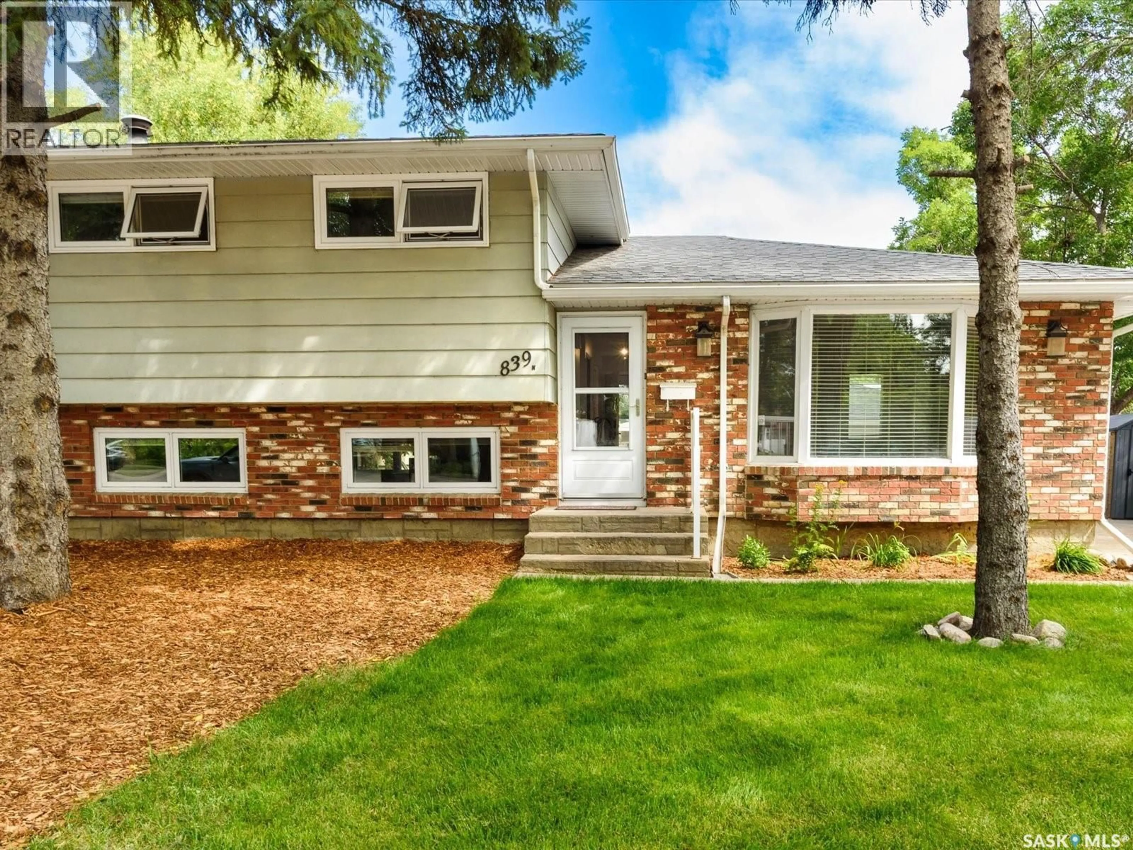 Home with vinyl exterior material, street for 839 MCINTOSH STREET, Regina Saskatchewan S4R6H1