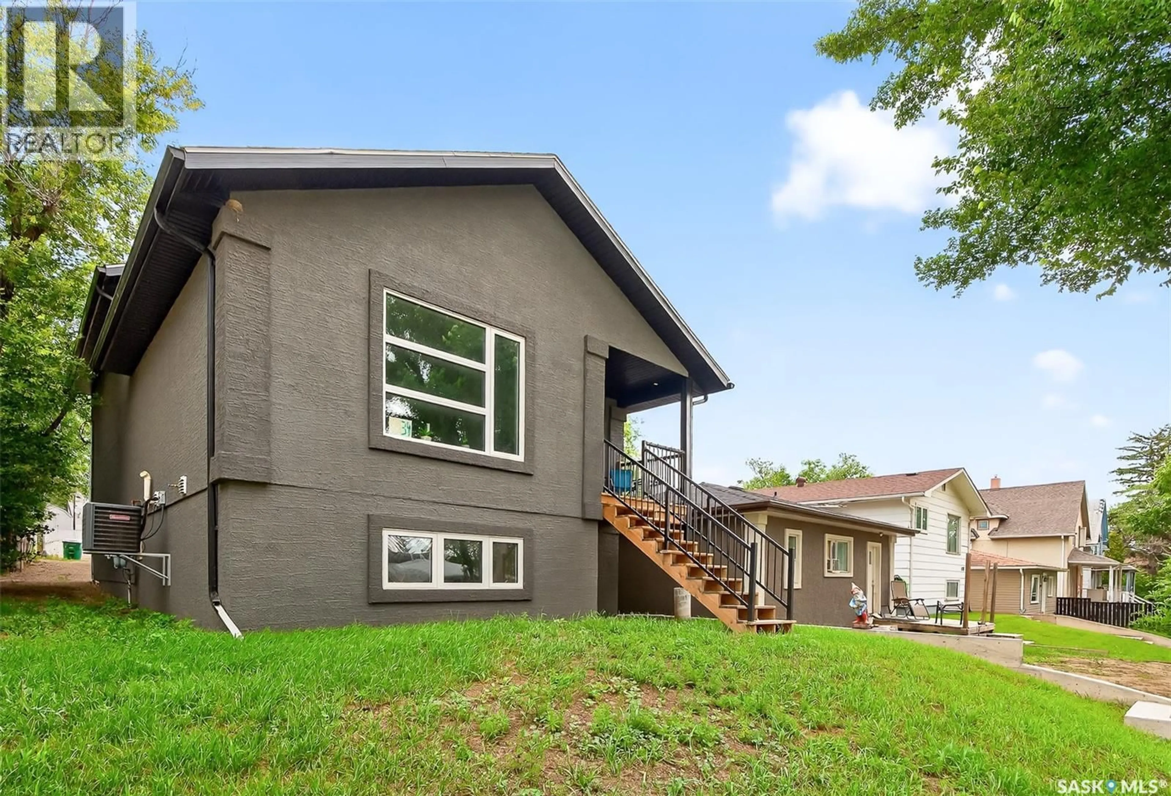Home with vinyl exterior material, mountain view for 1034 STADACONA STREET, Moose Jaw Saskatchewan S6H2B2