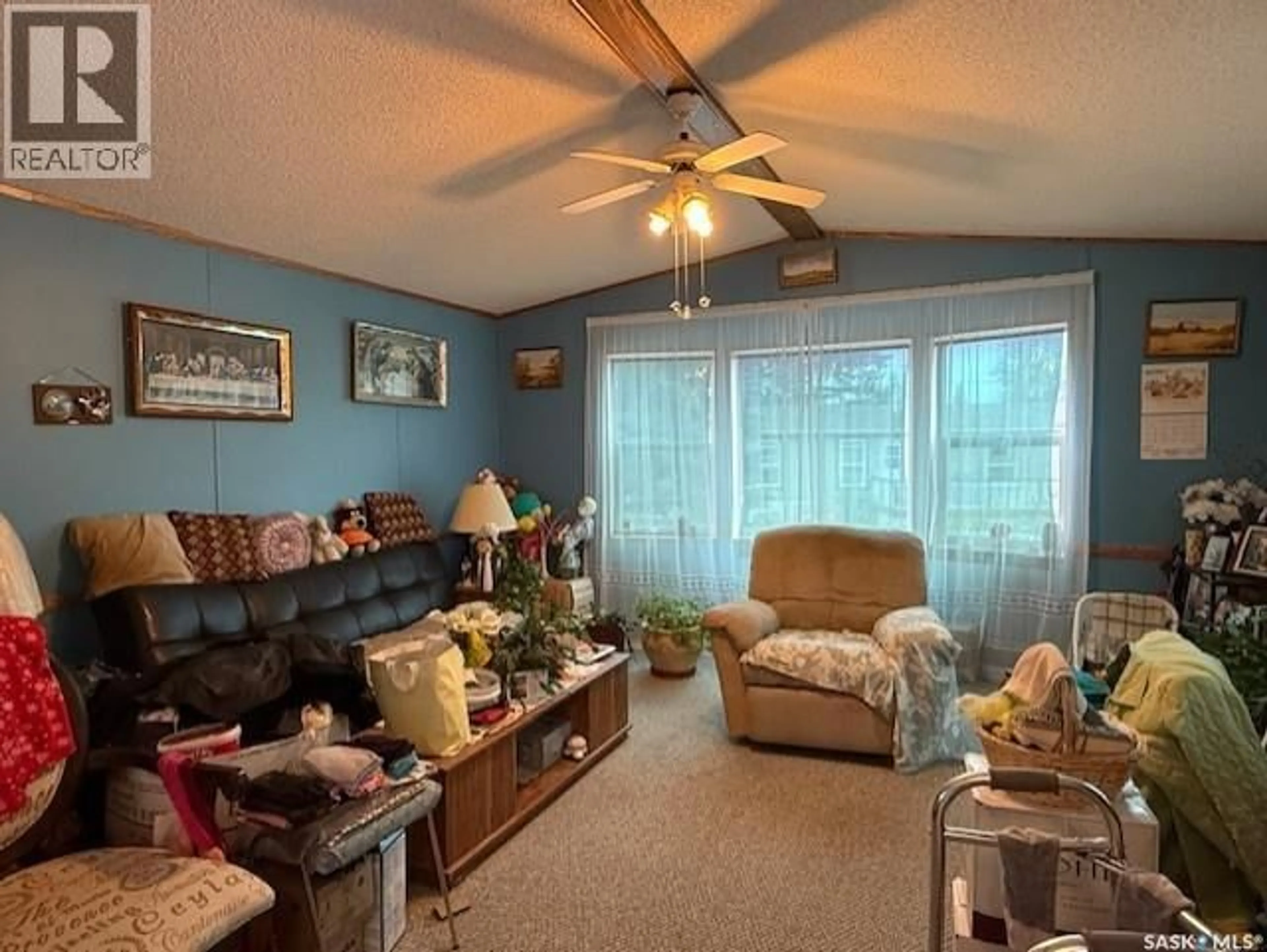 Living room with furniture, unknown for 25 555 DIELSCHNEIDER ROAD, Melville Saskatchewan S0A2P0