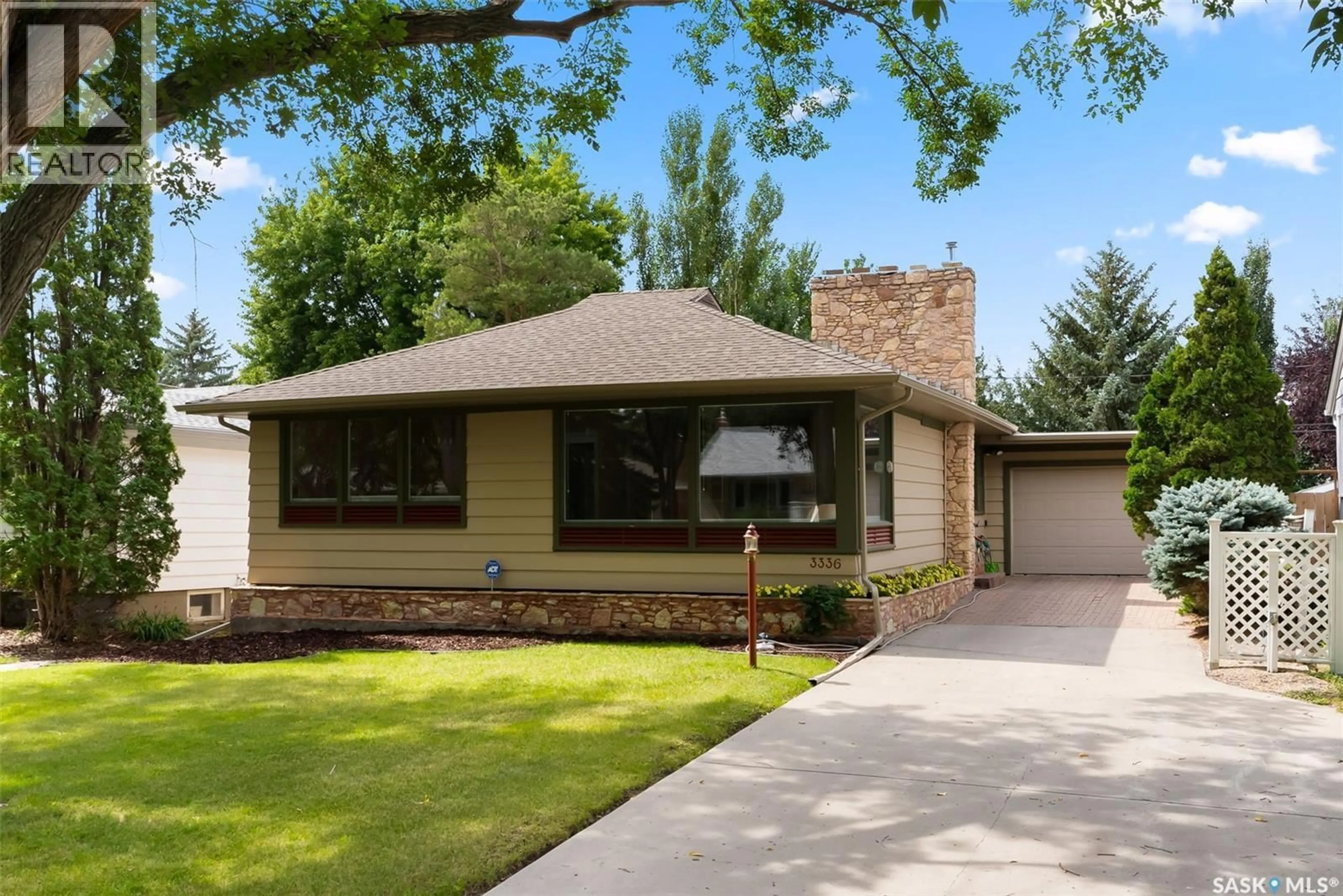 Home with vinyl exterior material, street for 3336 RAE STREET, Regina Saskatchewan S4S1S4