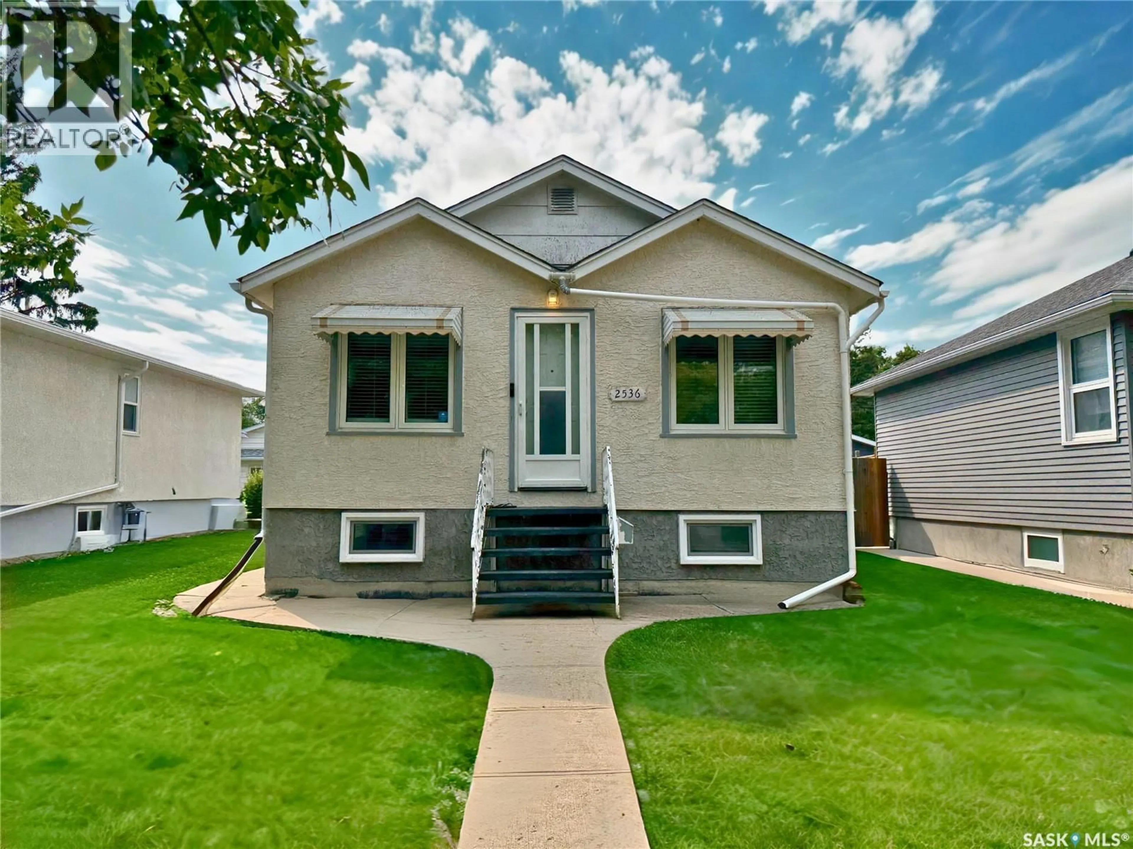 Home with vinyl exterior material, street for 2536 ELLIOTT STREET, Regina Saskatchewan S4N3H5