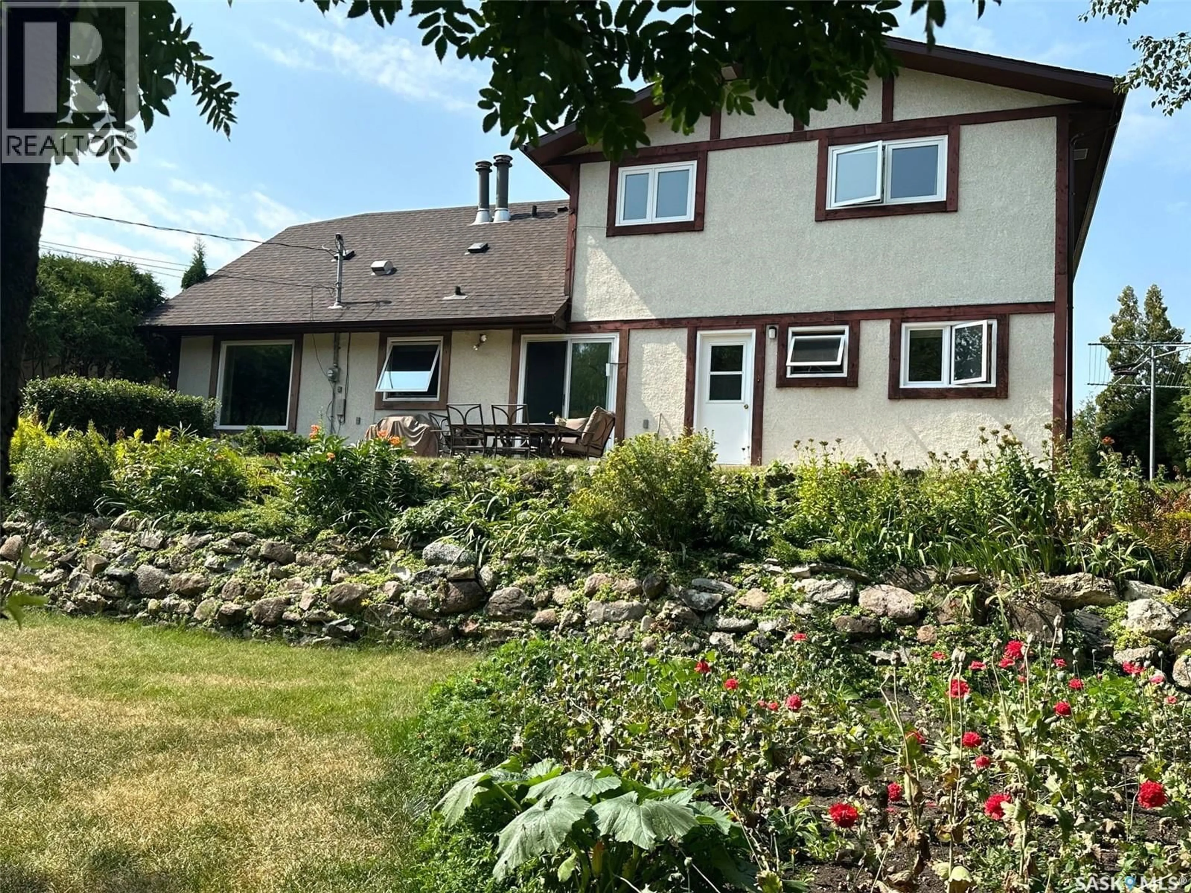 A pic from outside/outdoor area/front of a property/back of a property/a pic from drone, unknown for 706 DONALD STREET, Hudson Bay Saskatchewan S0E0Y0
