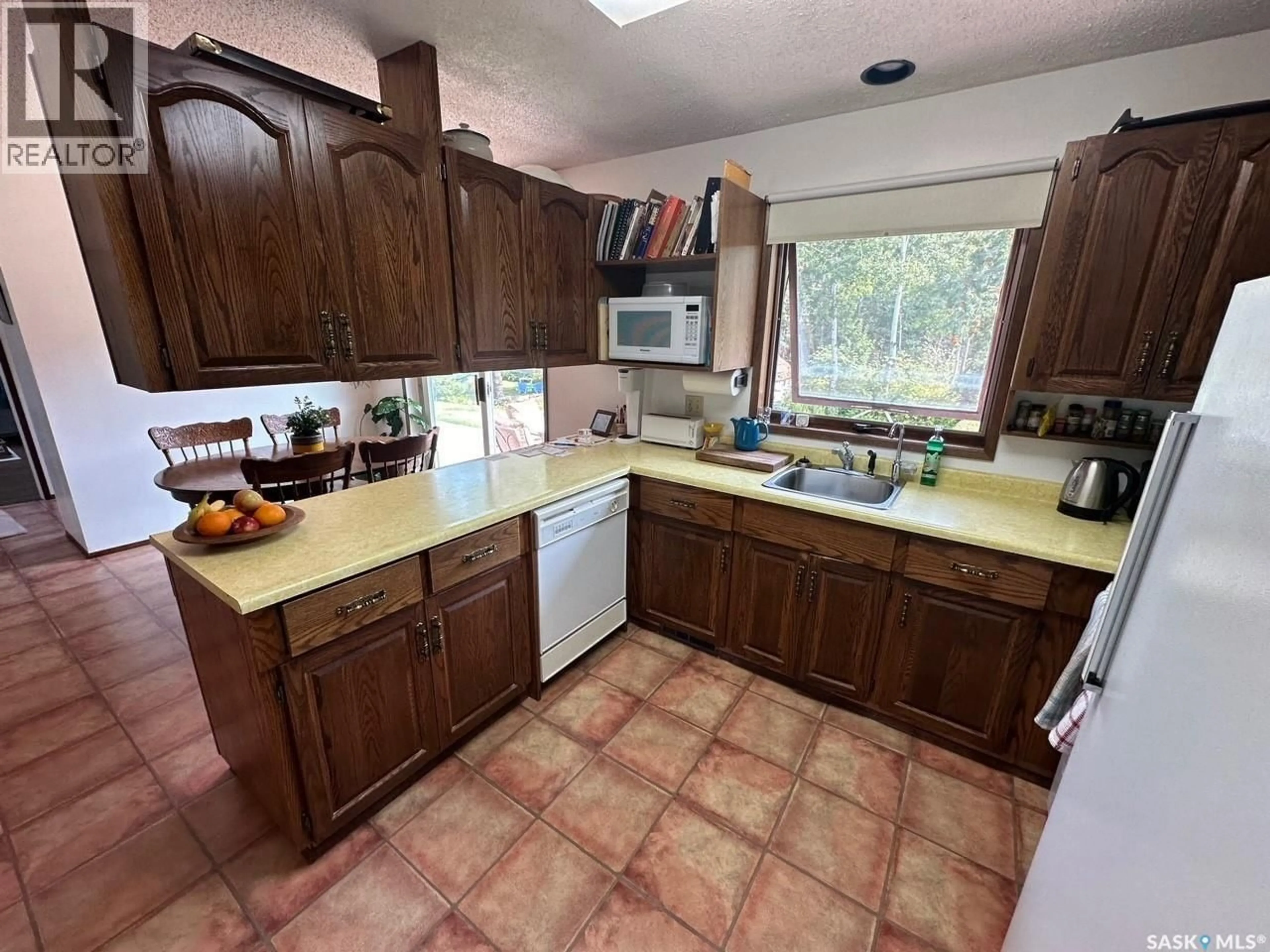 Standard kitchen, ceramic/tile floor for 706 DONALD STREET, Hudson Bay Saskatchewan S0E0Y0