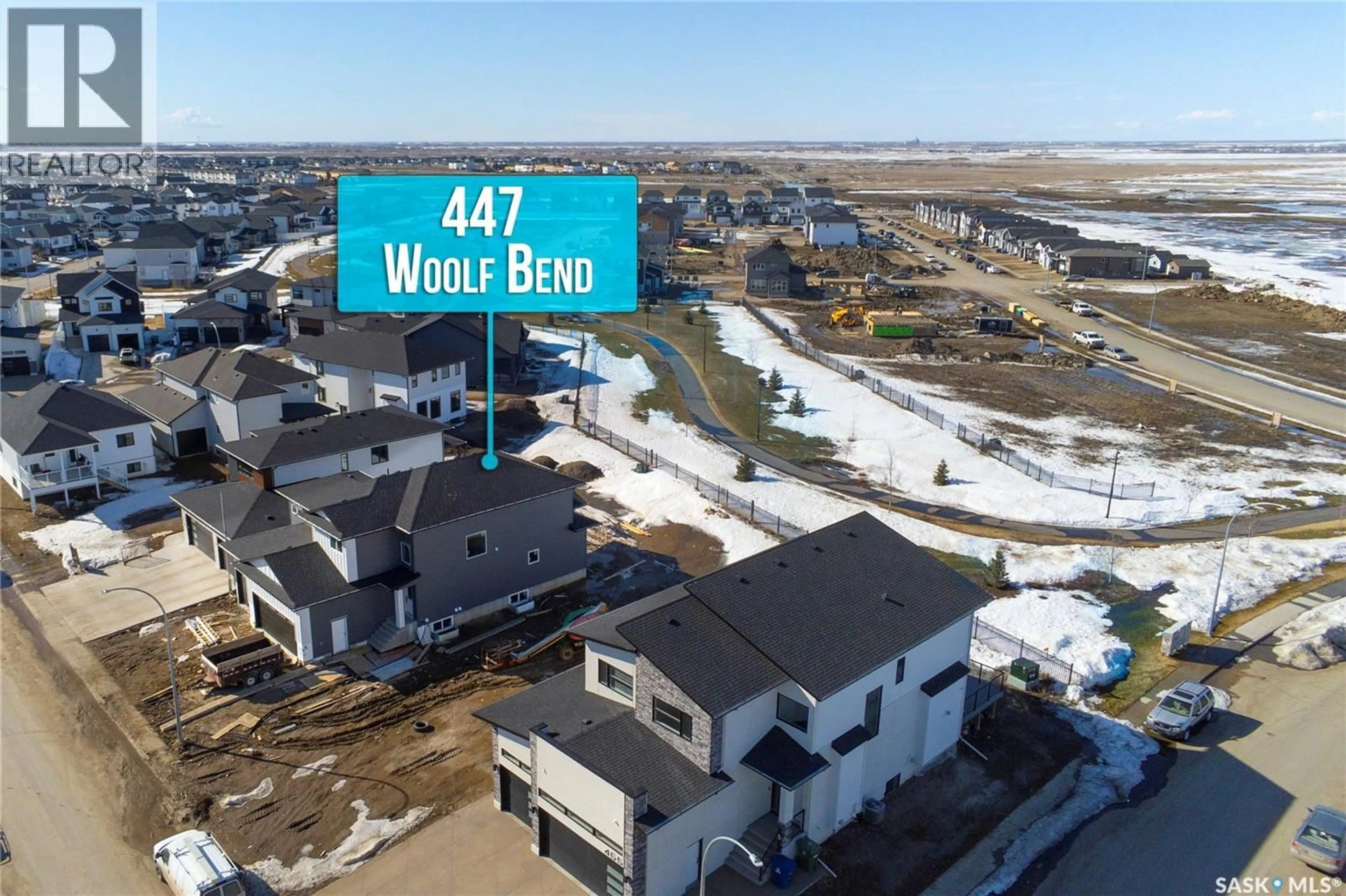 A pic from outside/outdoor area/front of a property/back of a property/a pic from drone, water/lake/river/ocean view for 447 WOOLF BEND, Saskatoon Saskatchewan S7W1E6