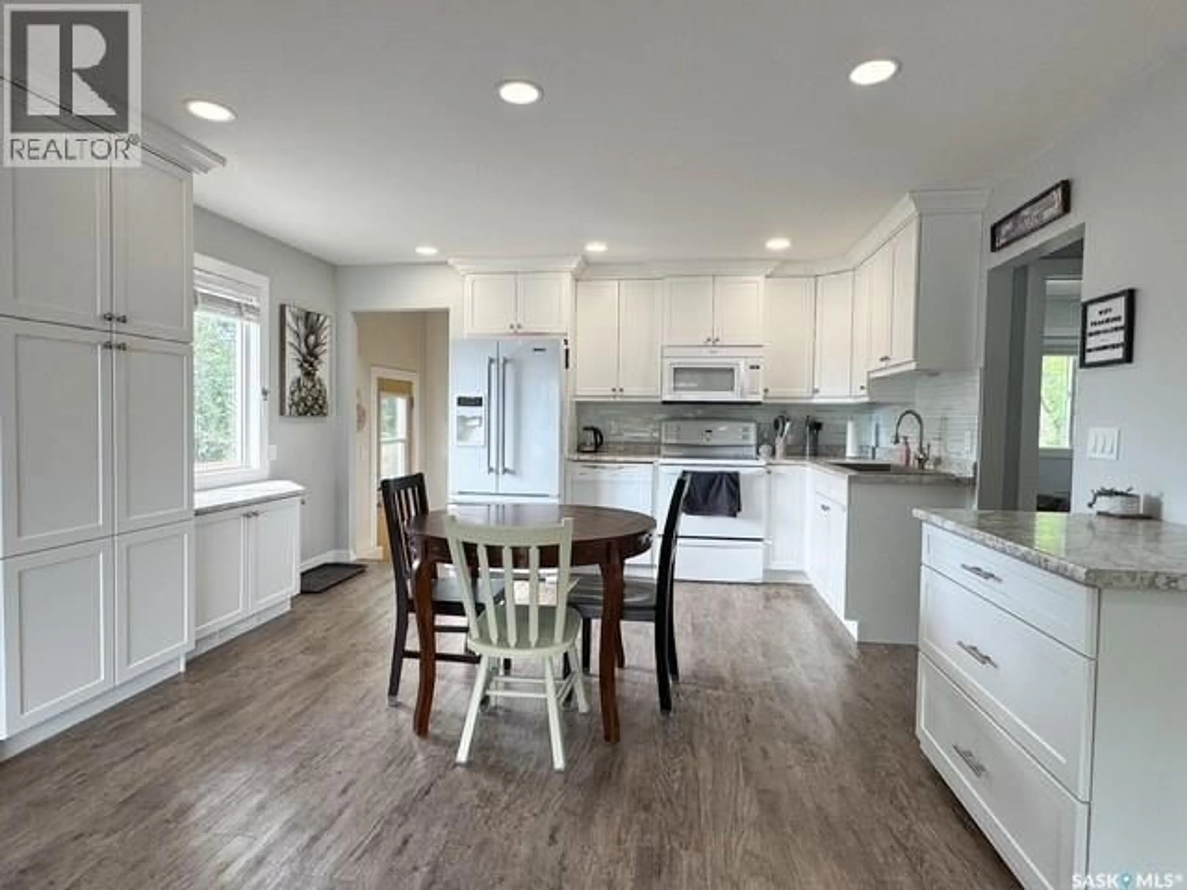 Open concept kitchen, unknown for 1113 BELL STREET, Swift Current Saskatchewan S9H1S3