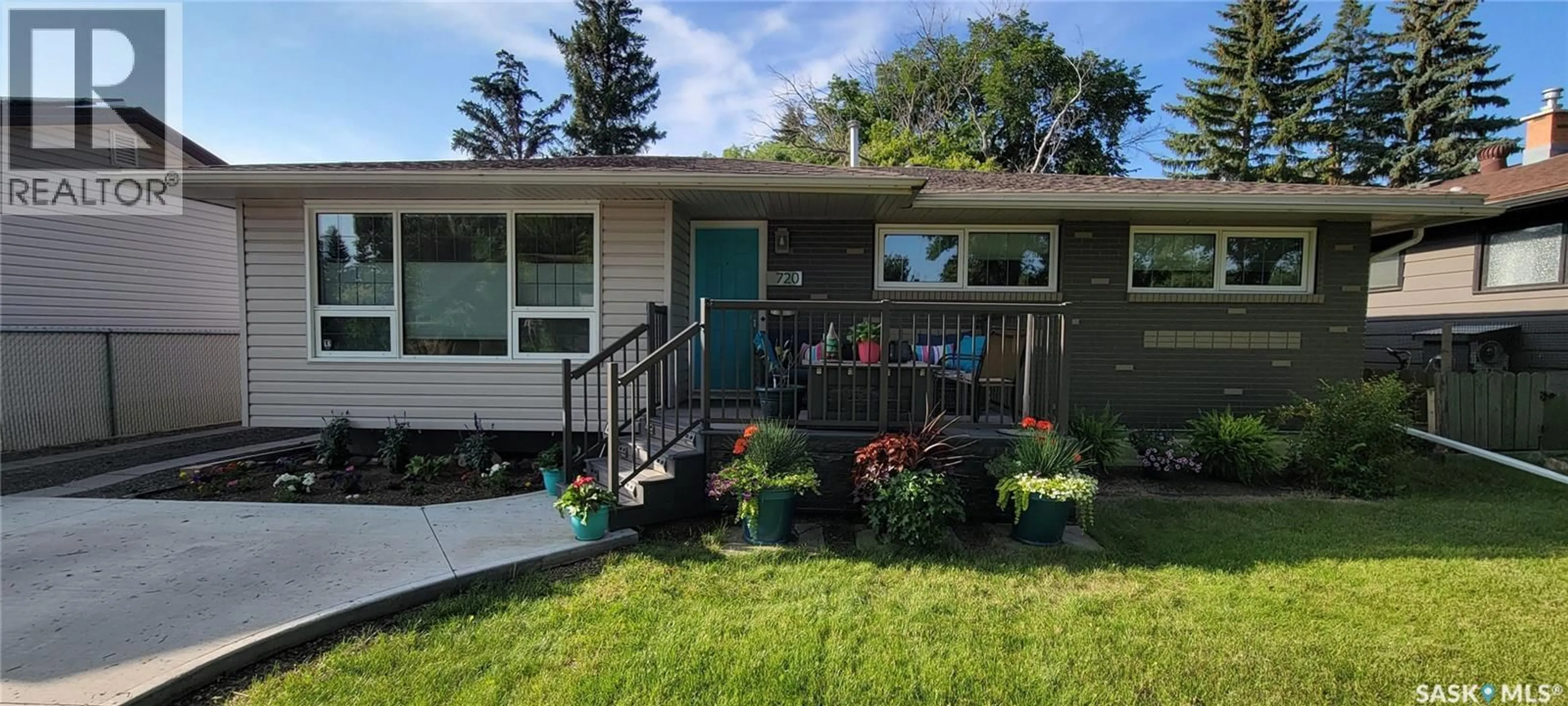 Home with vinyl exterior material, street for 720 SHANNON ROAD, Regina Saskatchewan S4S5J9