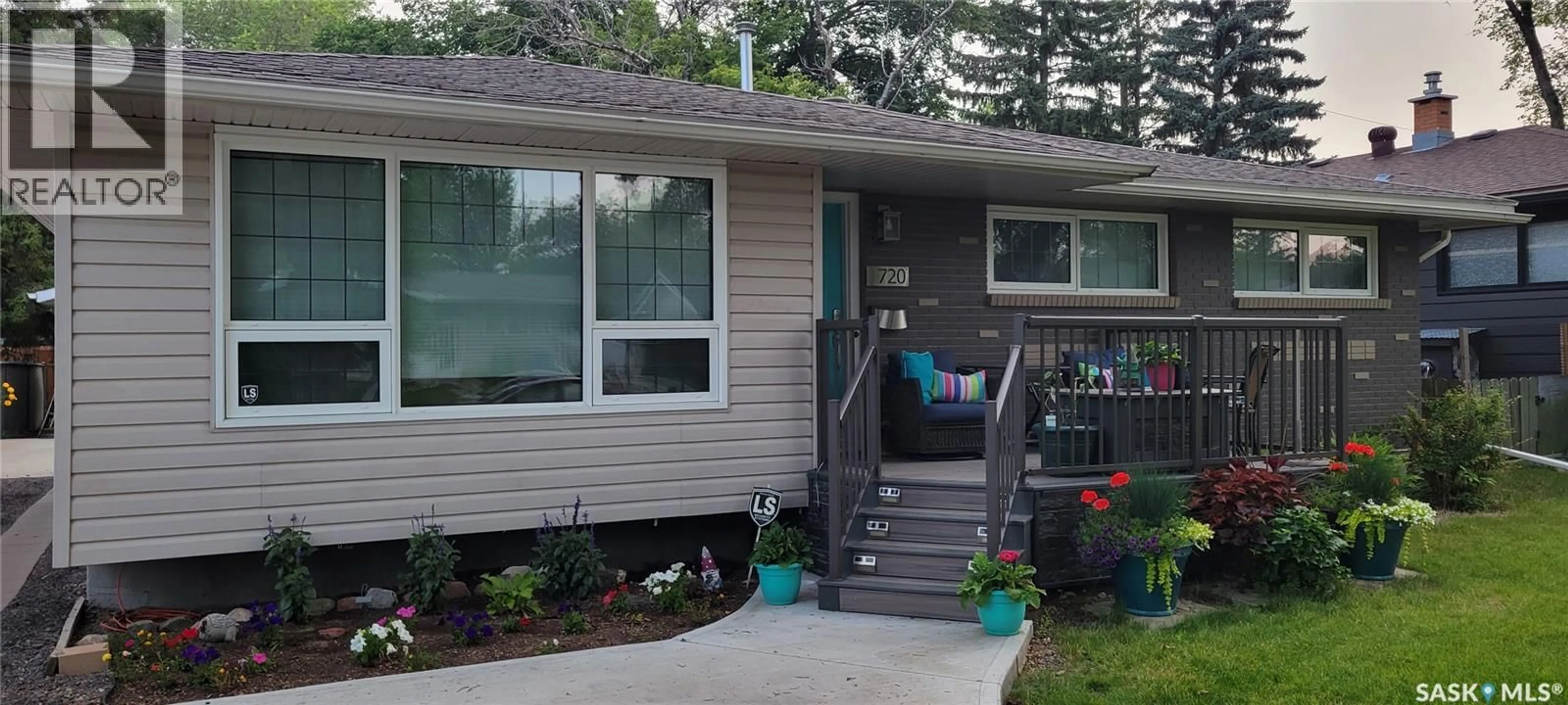 Home with vinyl exterior material, street for 720 SHANNON ROAD, Regina Saskatchewan S4S5J9