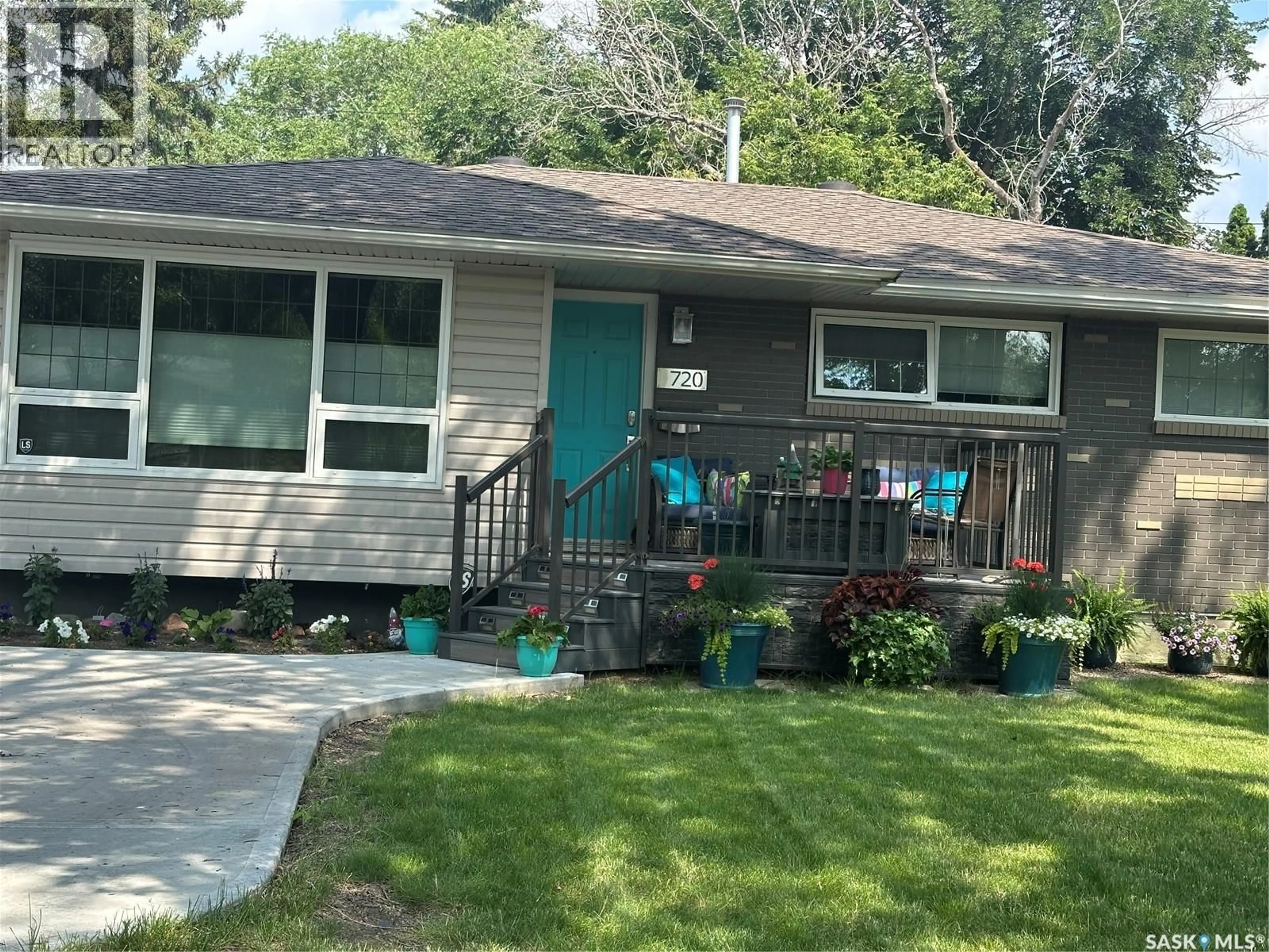 Home with vinyl exterior material, street for 720 SHANNON ROAD, Regina Saskatchewan S4S5J9