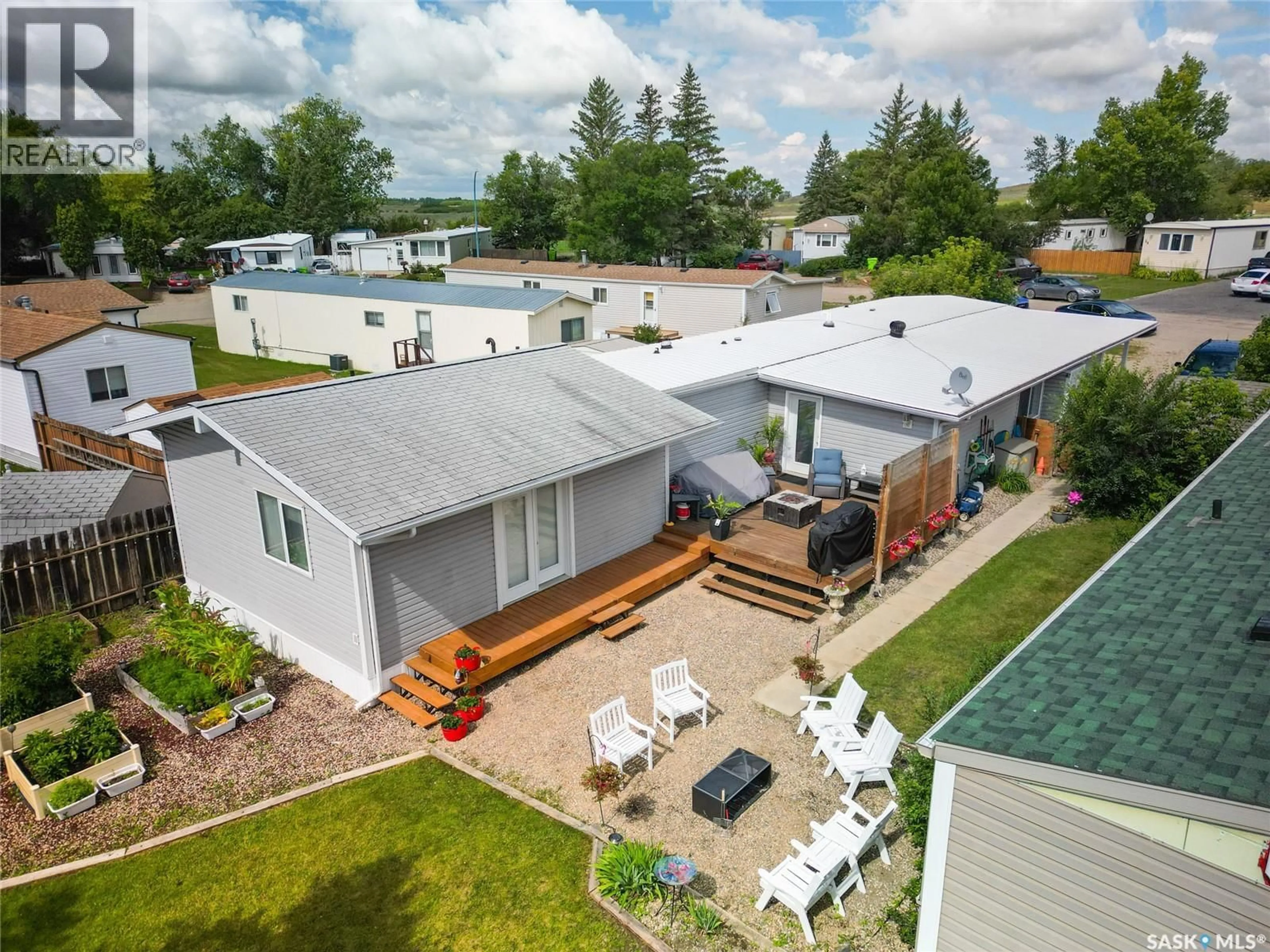 A pic from outside/outdoor area/front of a property/back of a property/a pic from drone, unknown for 20 CRYSTAL DRIVE, Edenwold Rm No. 158 Saskatchewan S4L1B3
