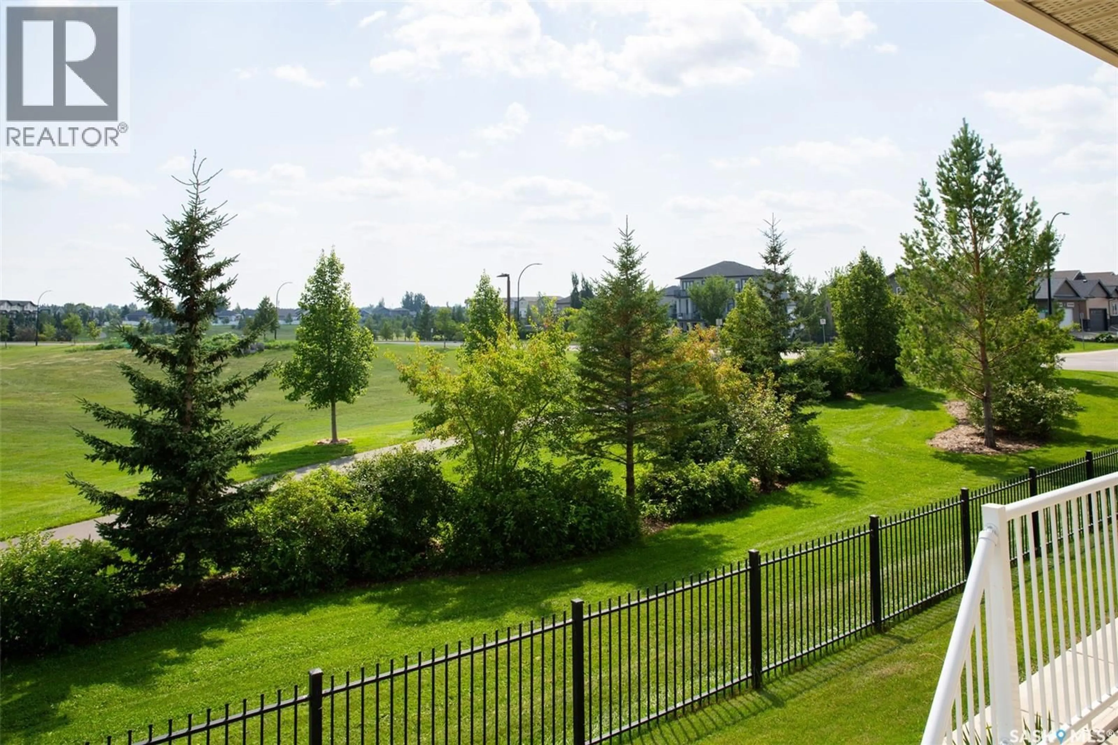 A pic from outside/outdoor area/front of a property/back of a property/a pic from drone, forest/trees view for 315 - 223 HAMPTON CIRCLE, Saskatoon Saskatchewan S7R0J7