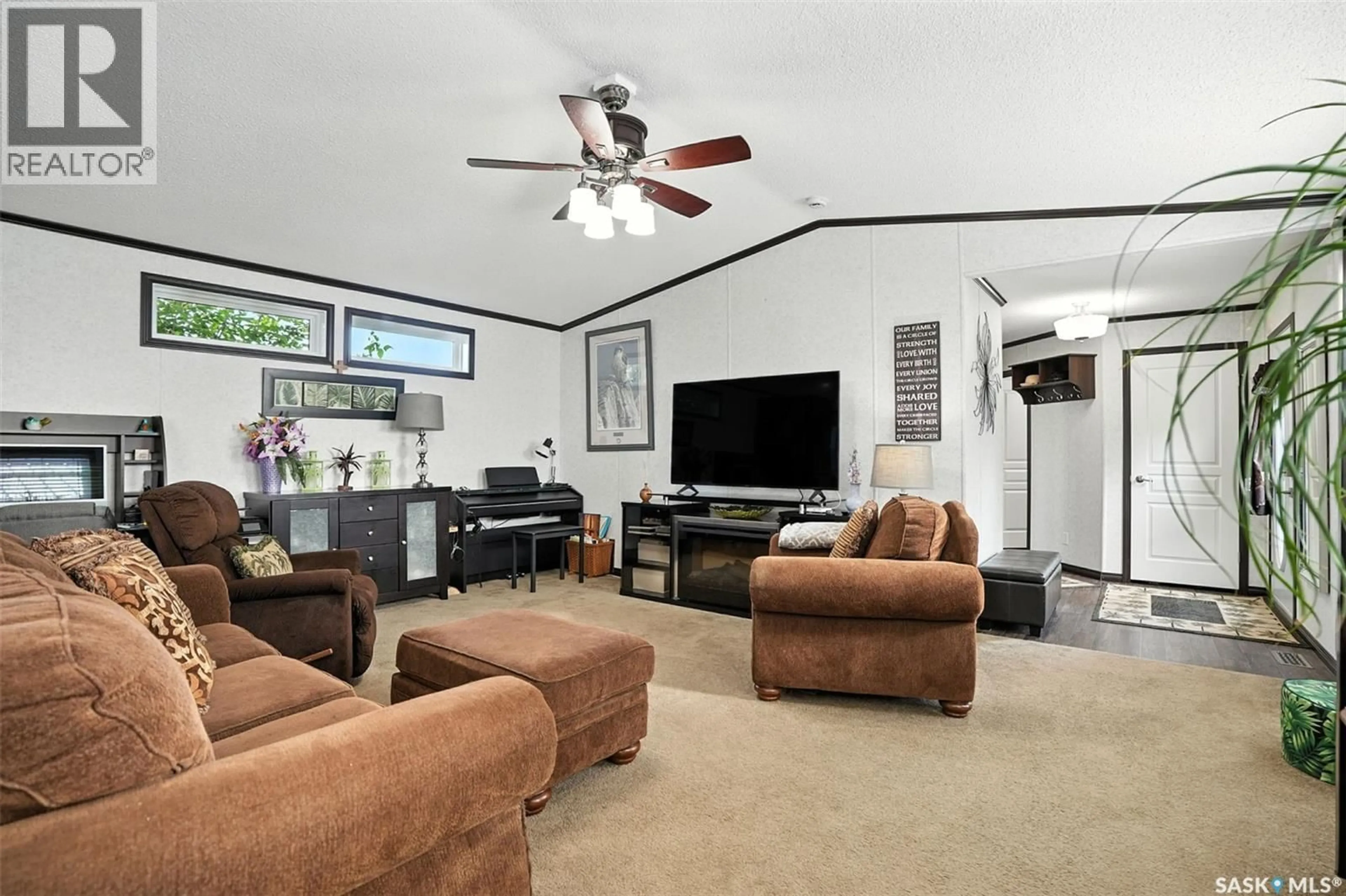 Living room with furniture, unknown for 34 TRILAND TRAILER COURT, Lanigan Saskatchewan S0K2M0