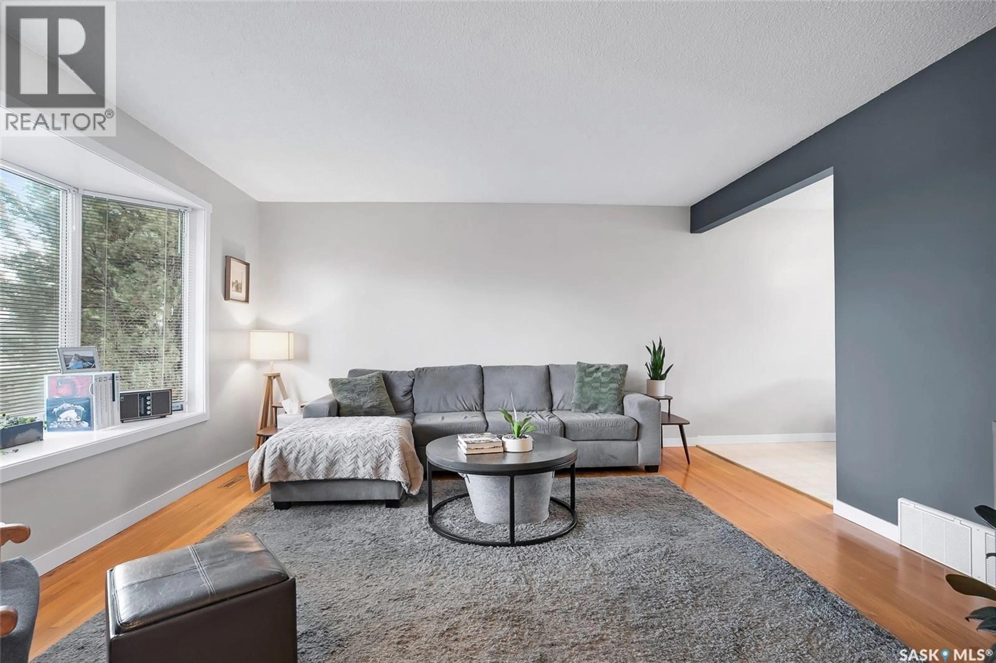 Living room with furniture, unknown for 929 TROTTER CRESCENT, Saskatoon Saskatchewan S7L3P9