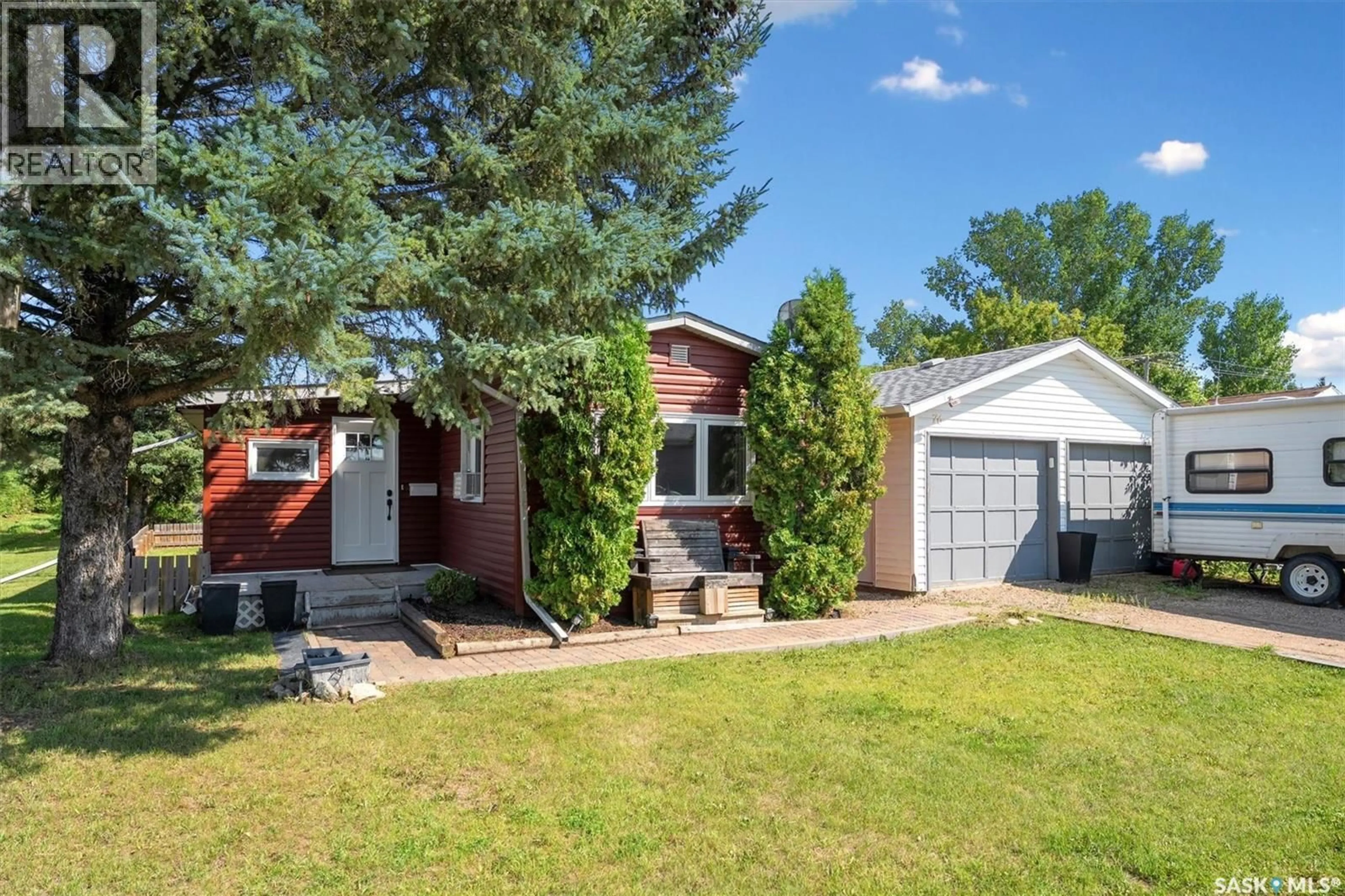 Home with vinyl exterior material, street for 76 2ND STREET, Osler Saskatchewan S0K3A0