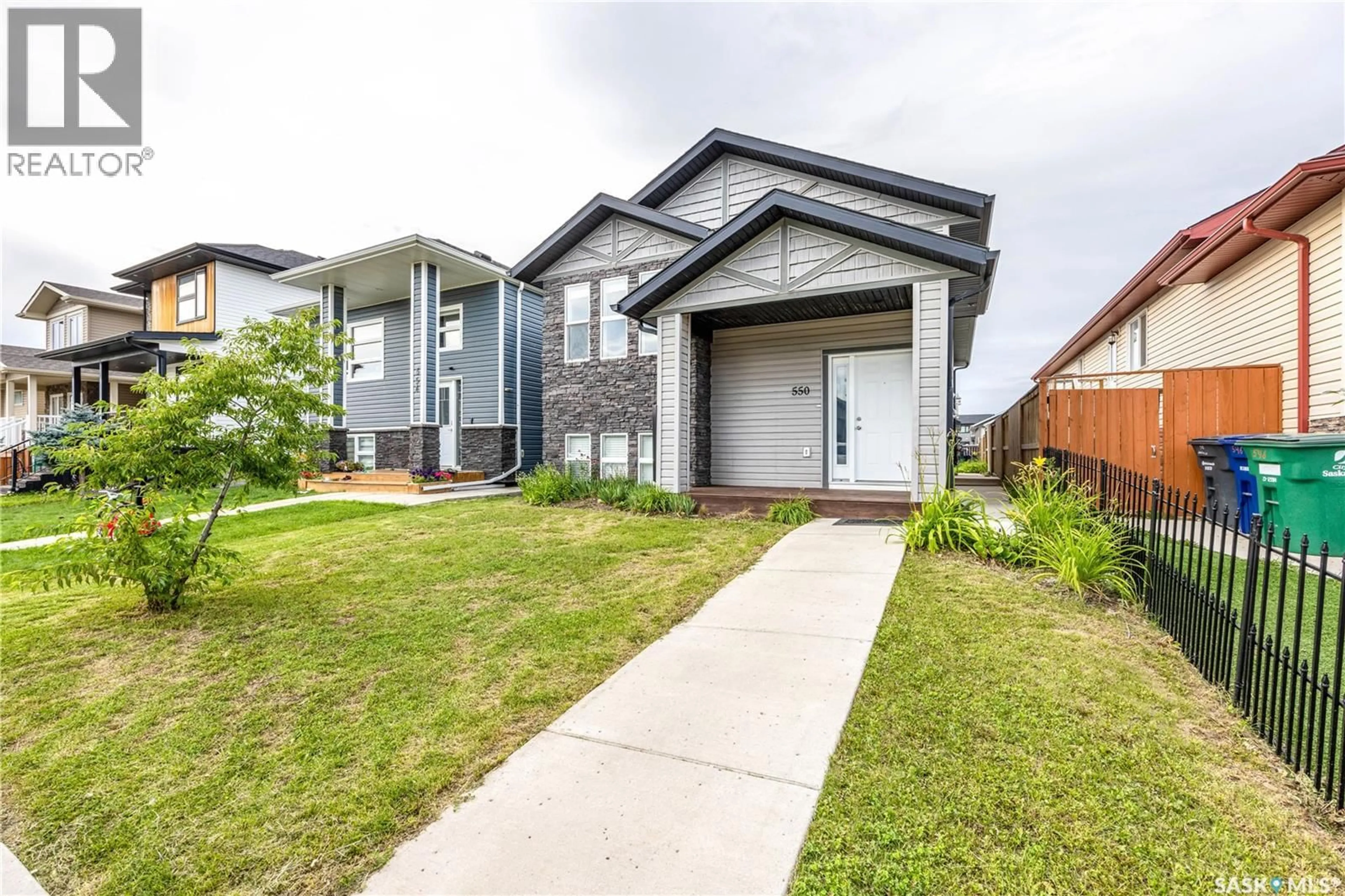 Home with brick exterior material, street for 550 MARLATTE LANE, Saskatoon Saskatchewan S7W0S8