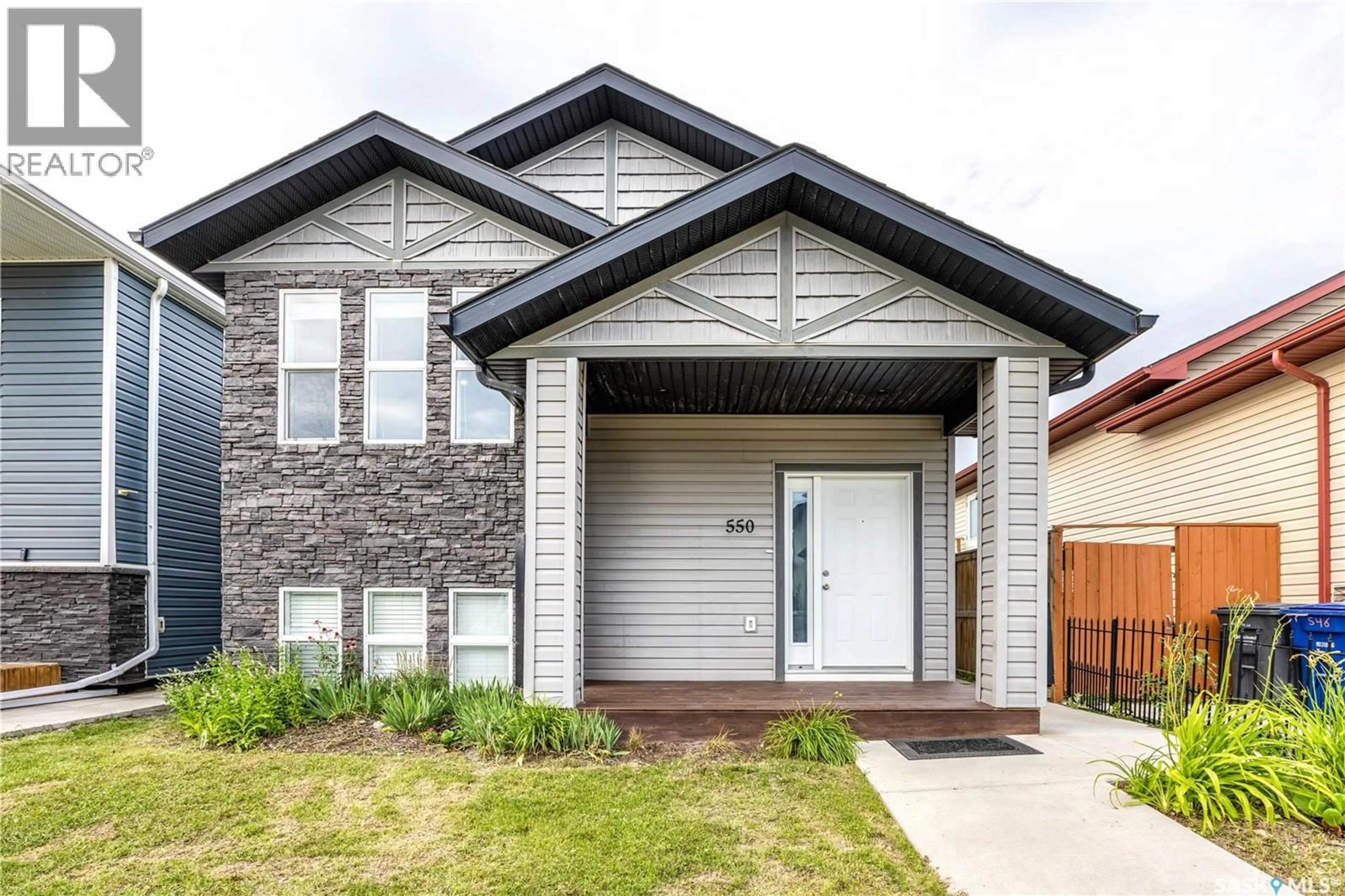 Home with brick exterior material, street for 550 MARLATTE LANE, Saskatoon Saskatchewan S7W0S8