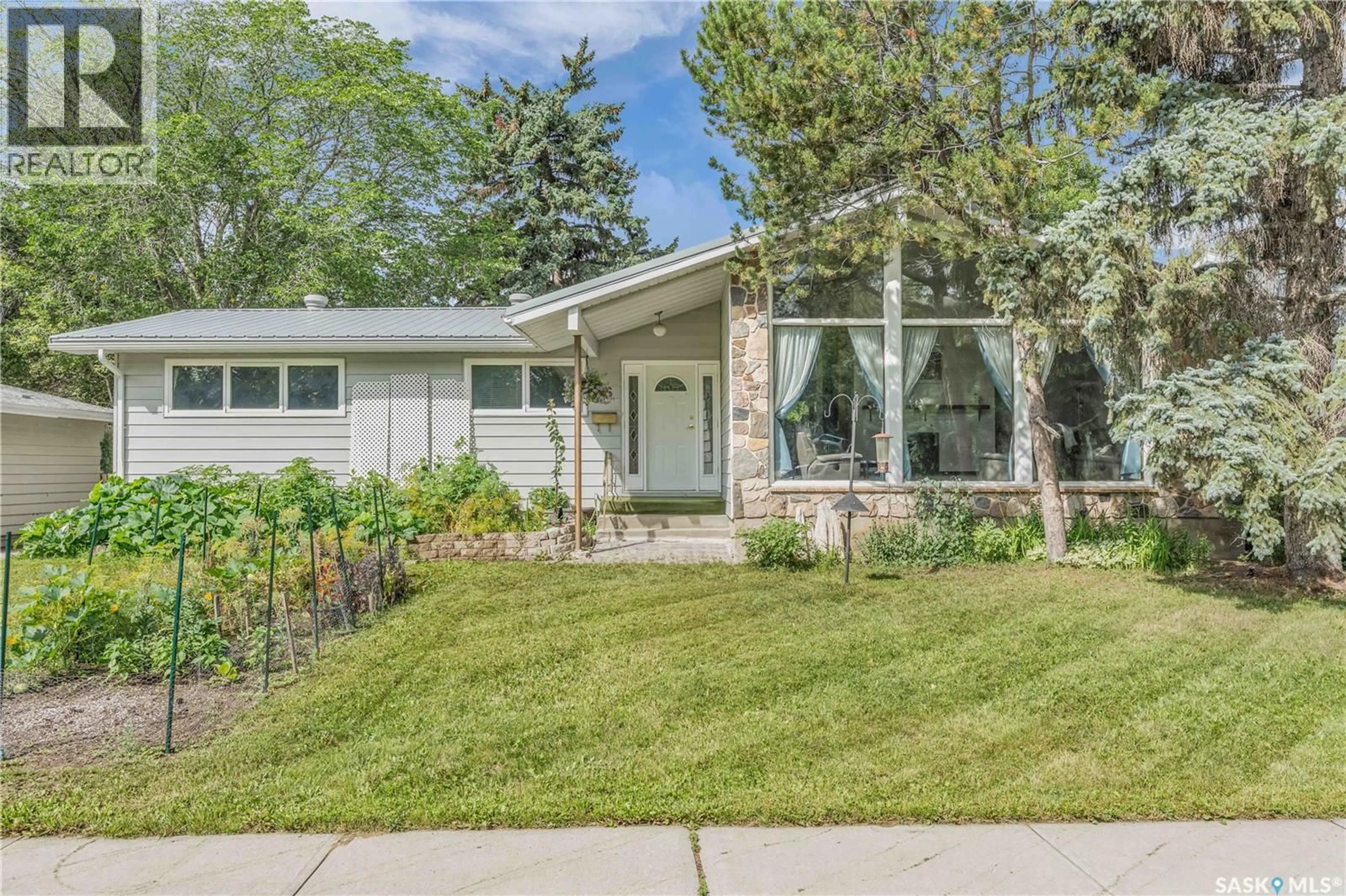 Home with vinyl exterior material, street for 16 MASSEY ROAD, Regina Saskatchewan S4S4M7