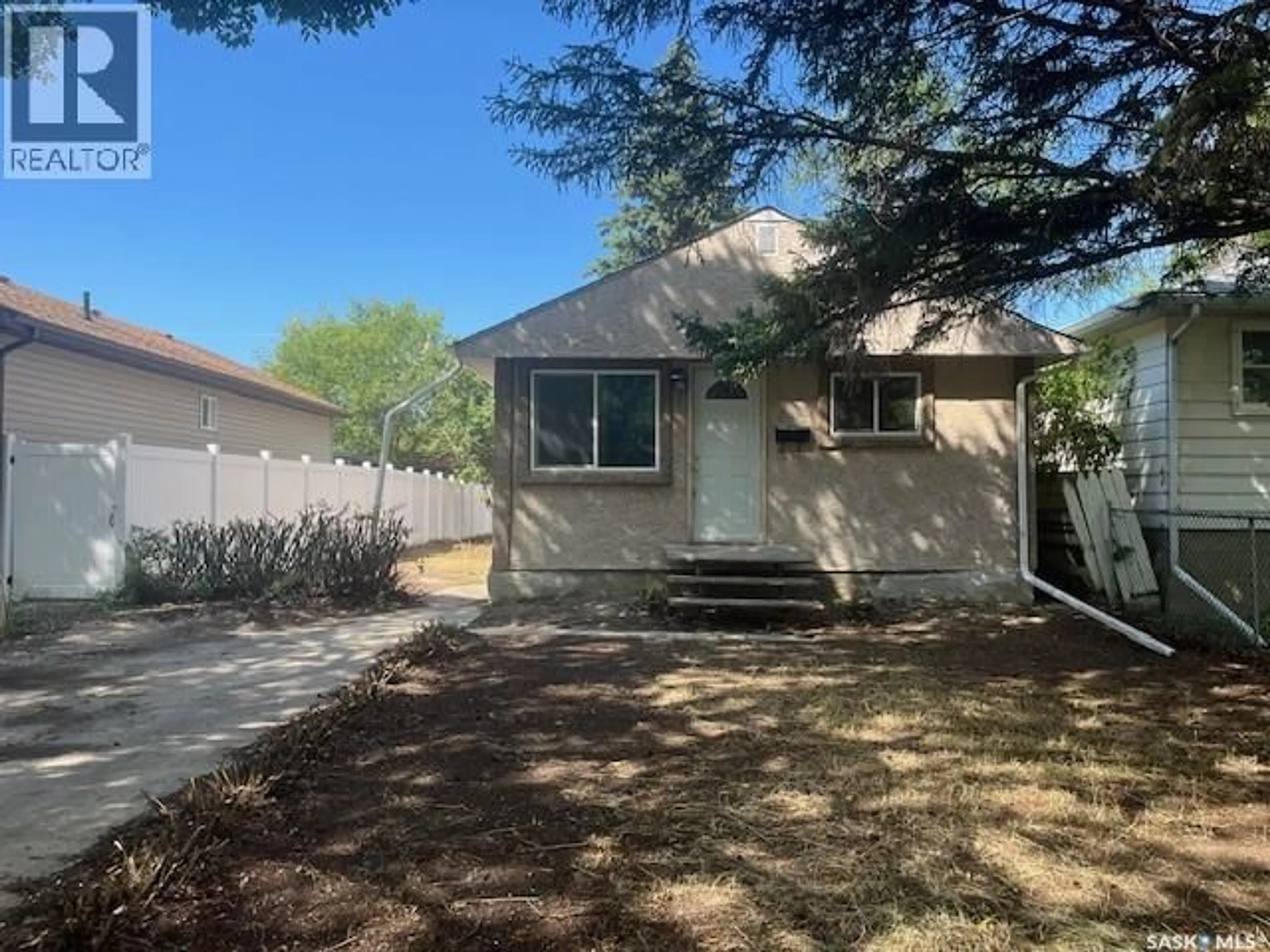 Home with vinyl exterior material, street for 270 SCARTH STREET, Regina Saskatchewan S4R2C1