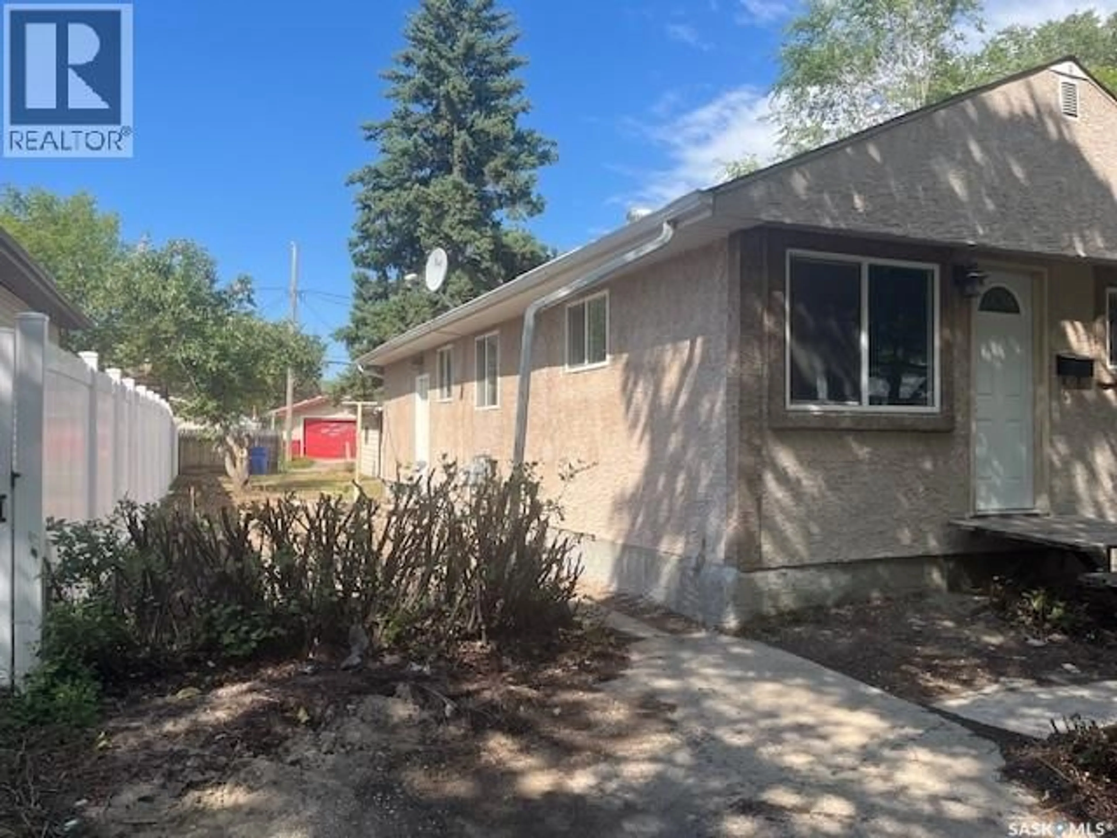 Home with vinyl exterior material, street for 270 SCARTH STREET, Regina Saskatchewan S4R2C1
