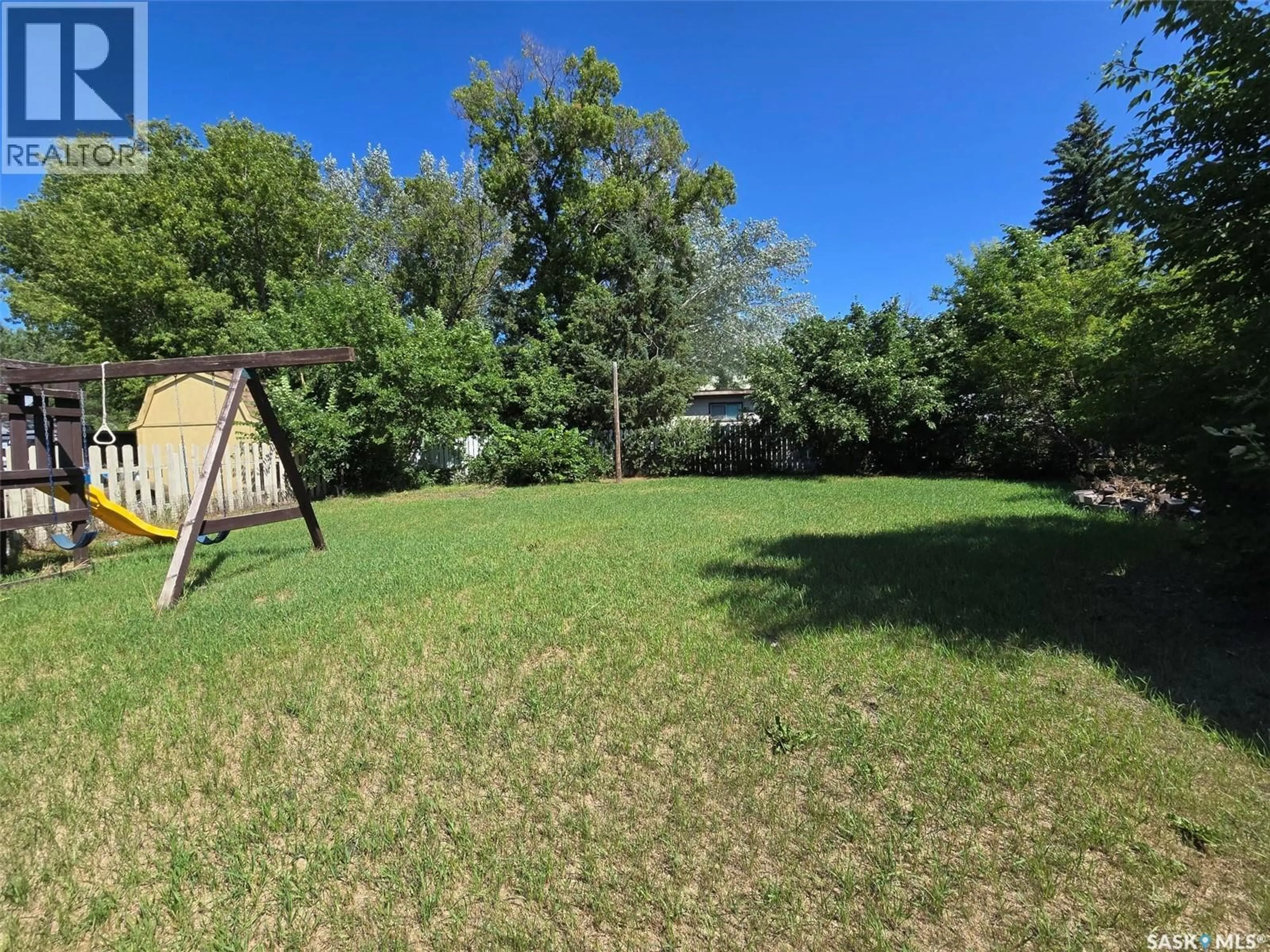 A pic from outside/outdoor area/front of a property/back of a property/a pic from drone, forest/trees view for 506 WATER STREET, Wolseley Saskatchewan S0G5H0