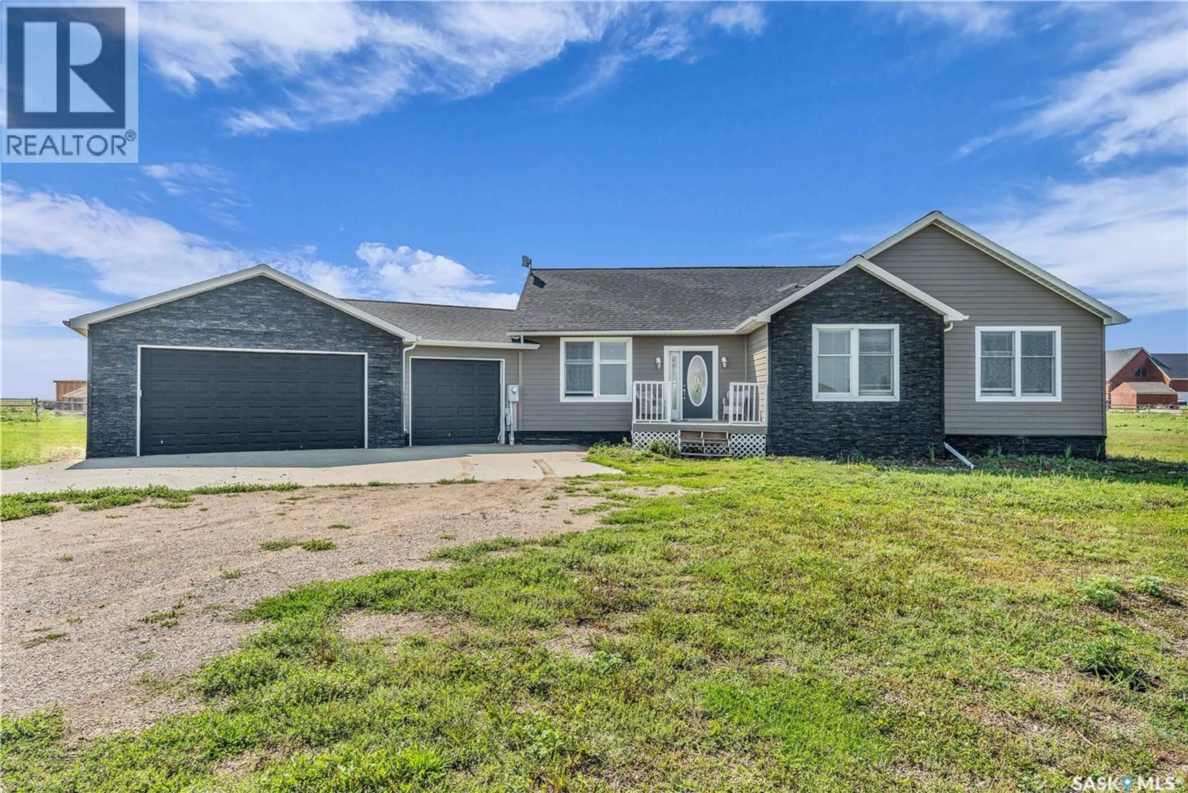 Home with vinyl exterior material, street for 8 EROS BAY, Lumsden Saskatchewan S0G3C0
