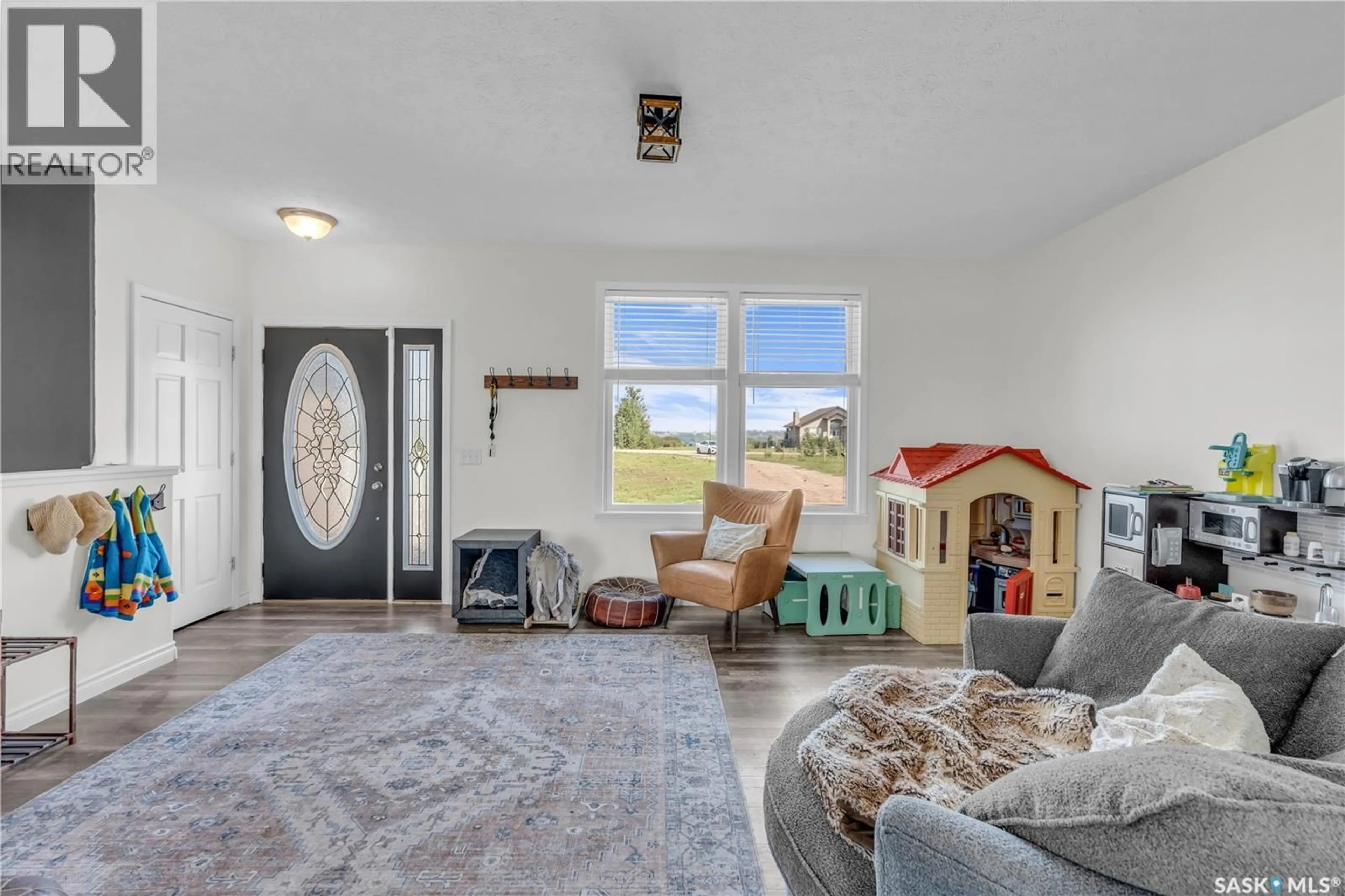Living room with furniture, unknown for 8 EROS BAY, Lumsden Saskatchewan S0G3C0