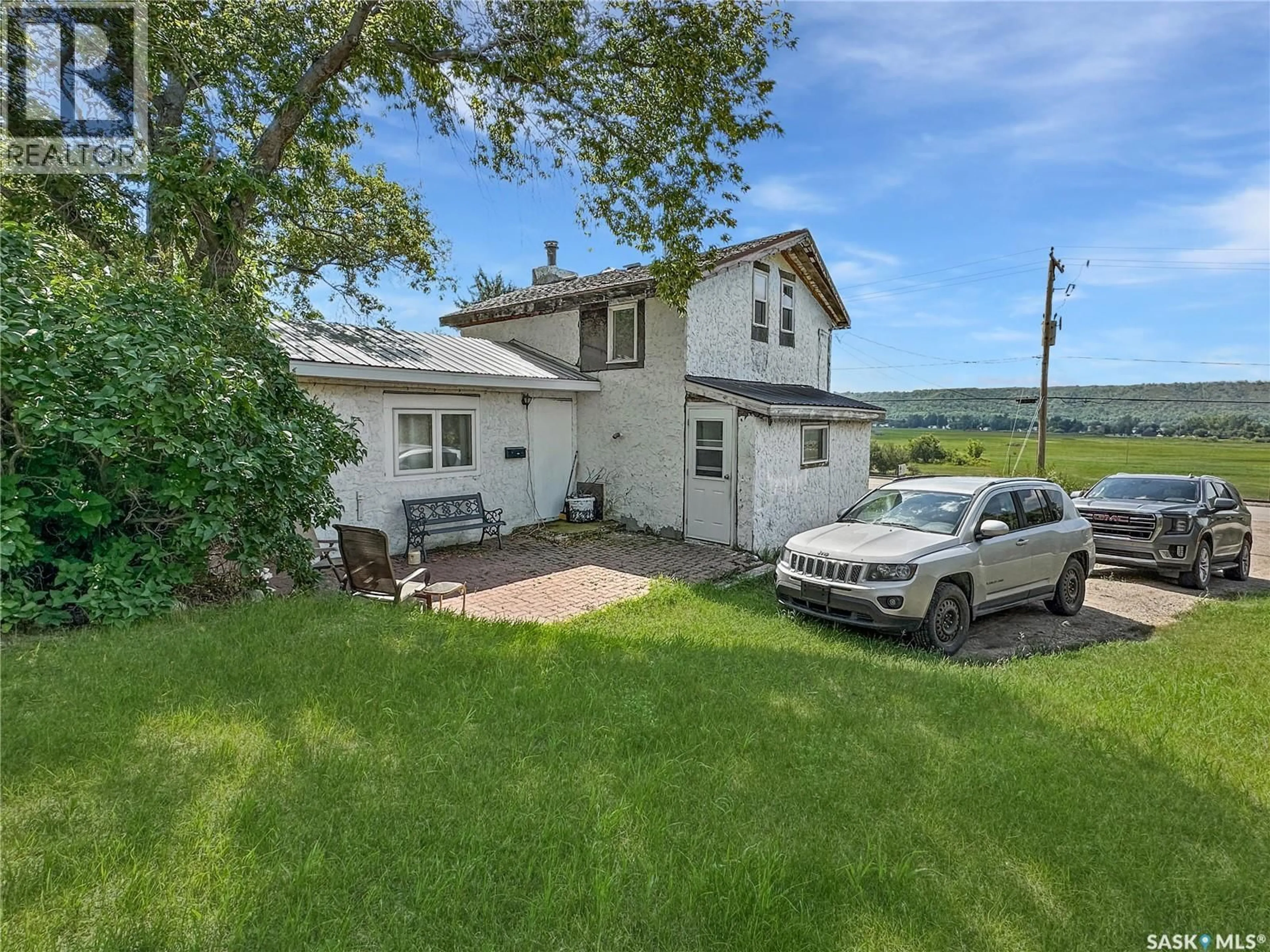 A pic from outside/outdoor area/front of a property/back of a property/a pic from drone, unknown for 118 ELLISBORO TRAIL, Lebret Saskatchewan S0G2Y0