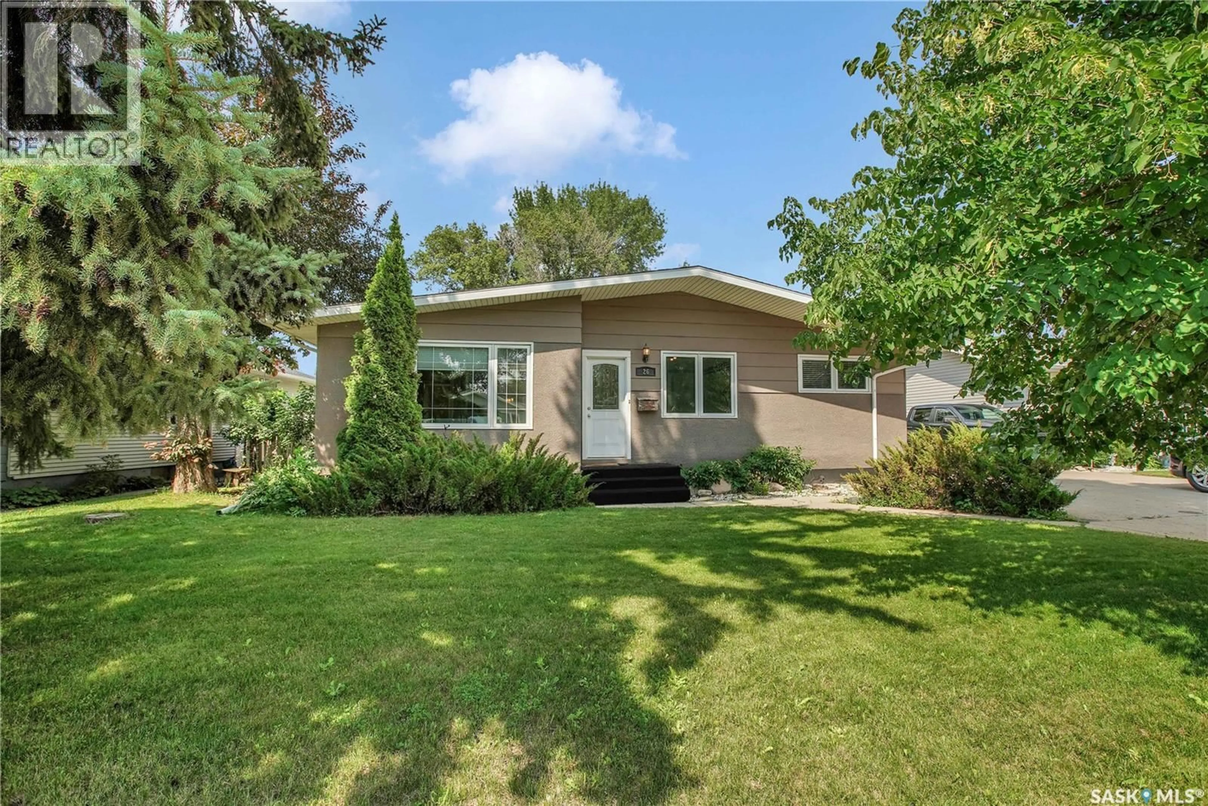 Home with vinyl exterior material, street for 26 COLUMBIA DRIVE, Saskatoon Saskatchewan S7K1E5