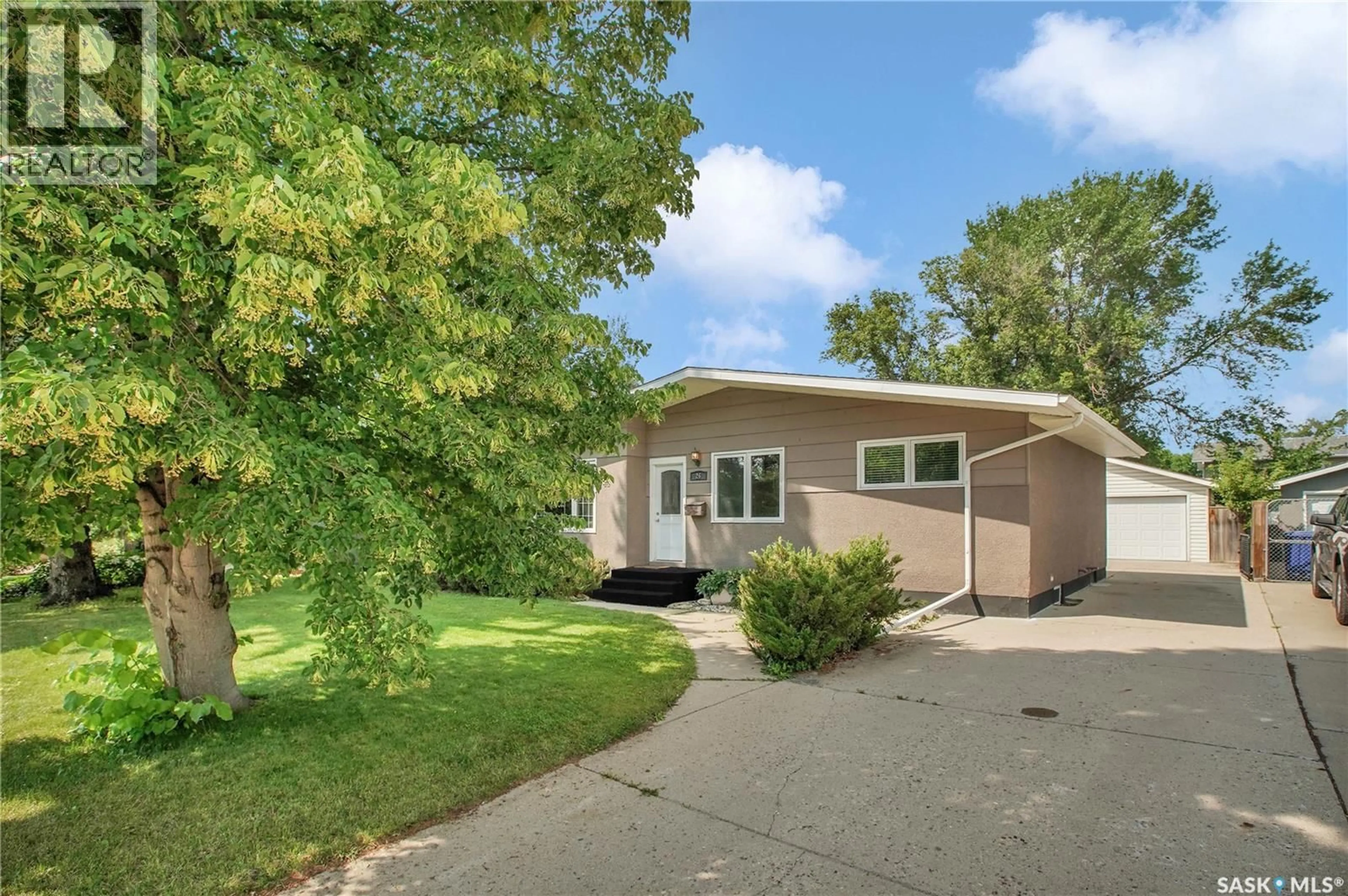 Home with vinyl exterior material, street for 26 COLUMBIA DRIVE, Saskatoon Saskatchewan S7K1E5