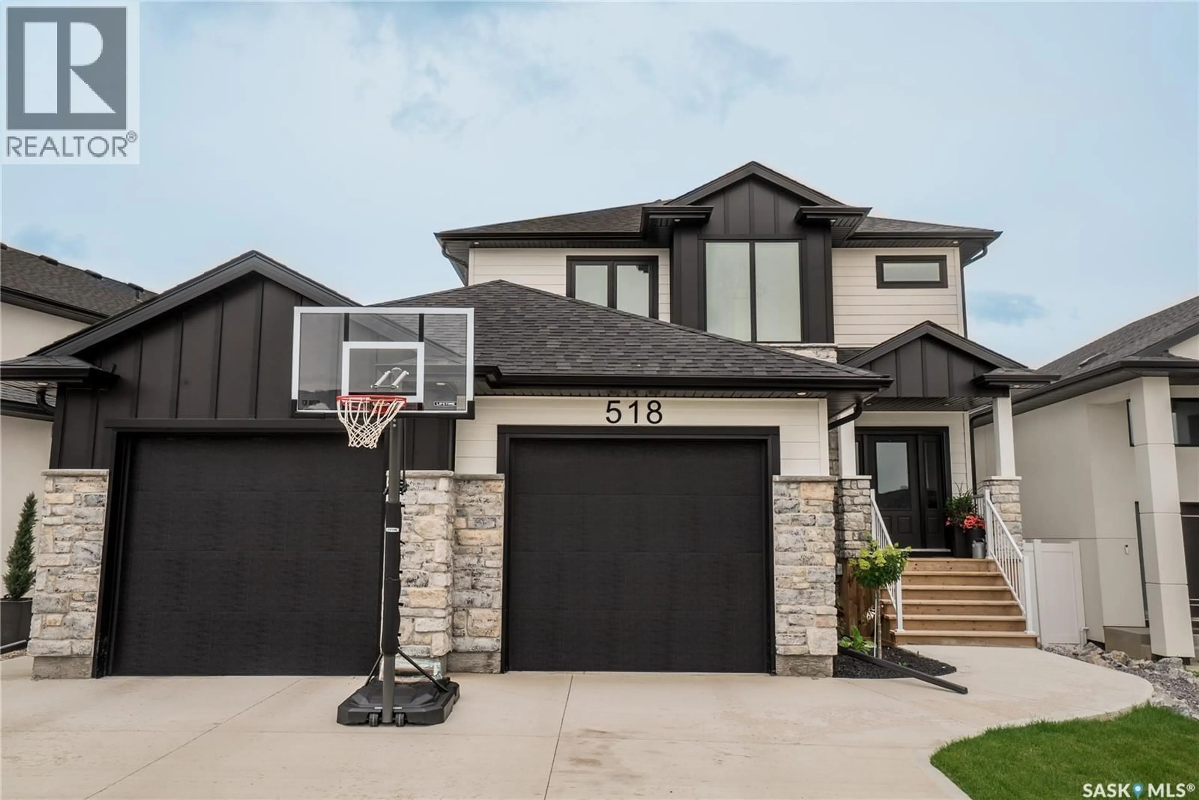 Home with vinyl exterior material, street for 518 HAMM CRESCENT, Saskatoon Saskatchewan S7V0Z2