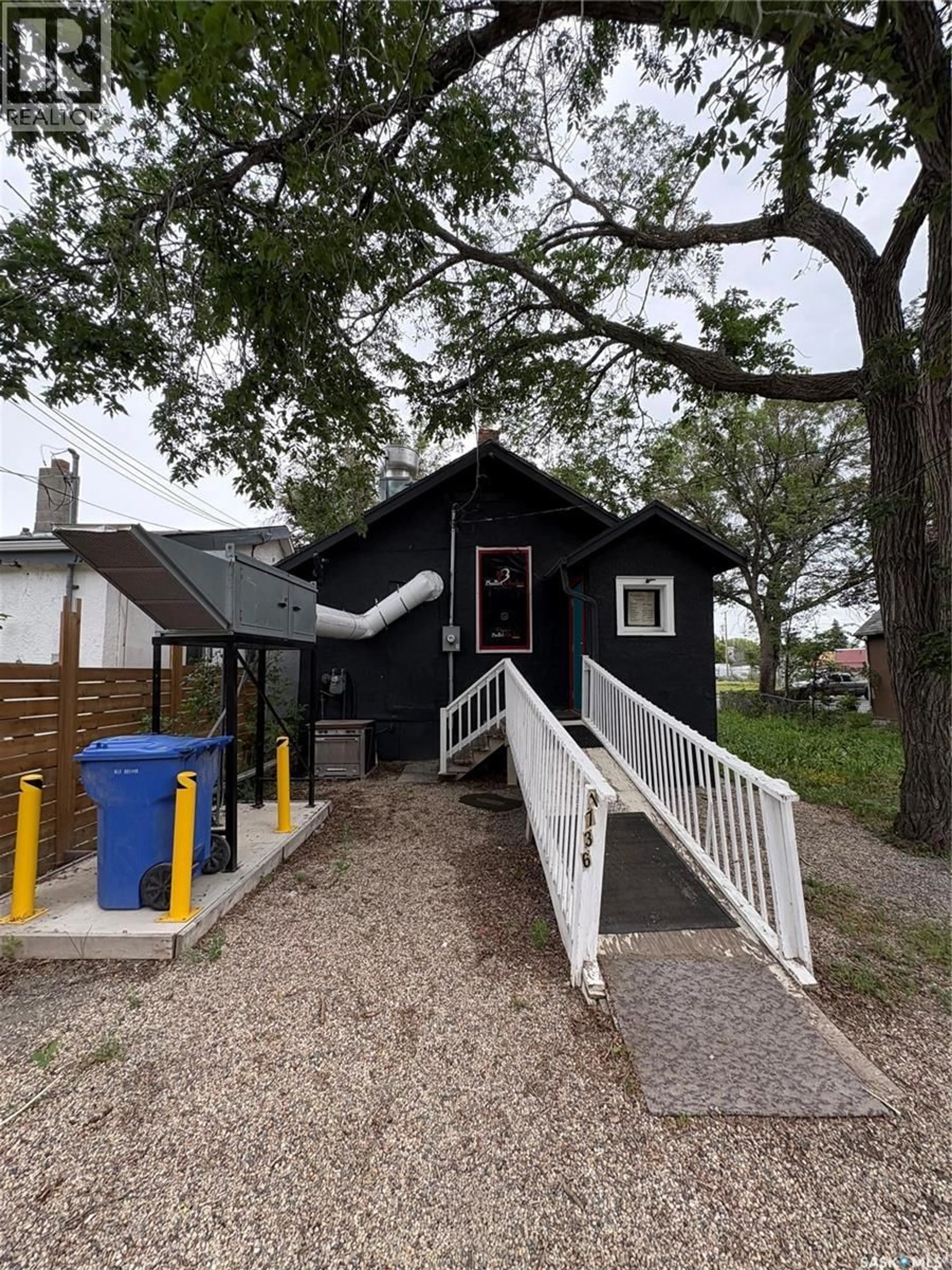 Home with vinyl exterior material, street for 1736 WINNIPEG STREET, Regina Saskatchewan S4P1E9