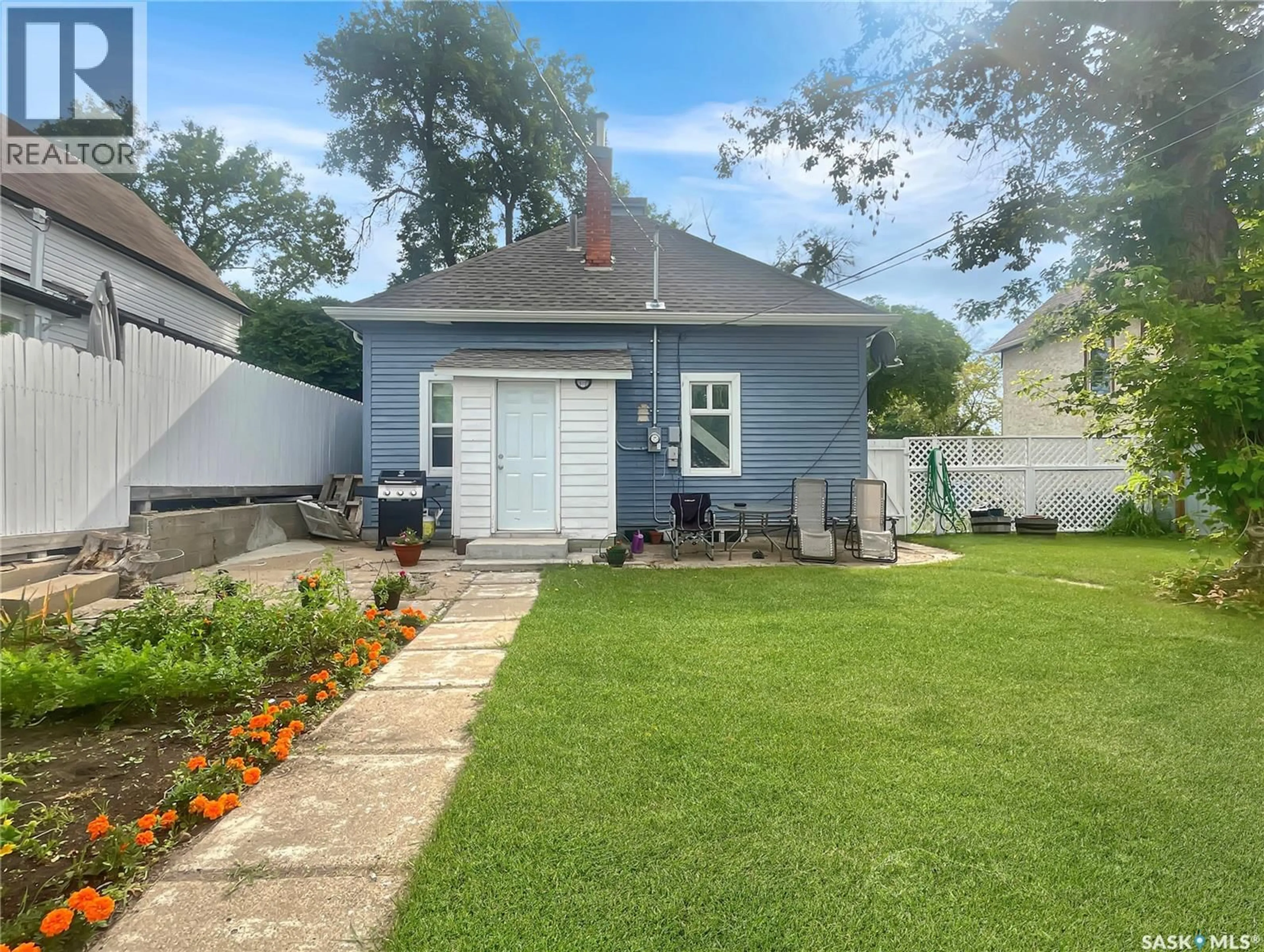 A pic from outside/outdoor area/front of a property/back of a property/a pic from drone, street for 1311 97TH STREET, North Battleford Saskatchewan S9A0J8
