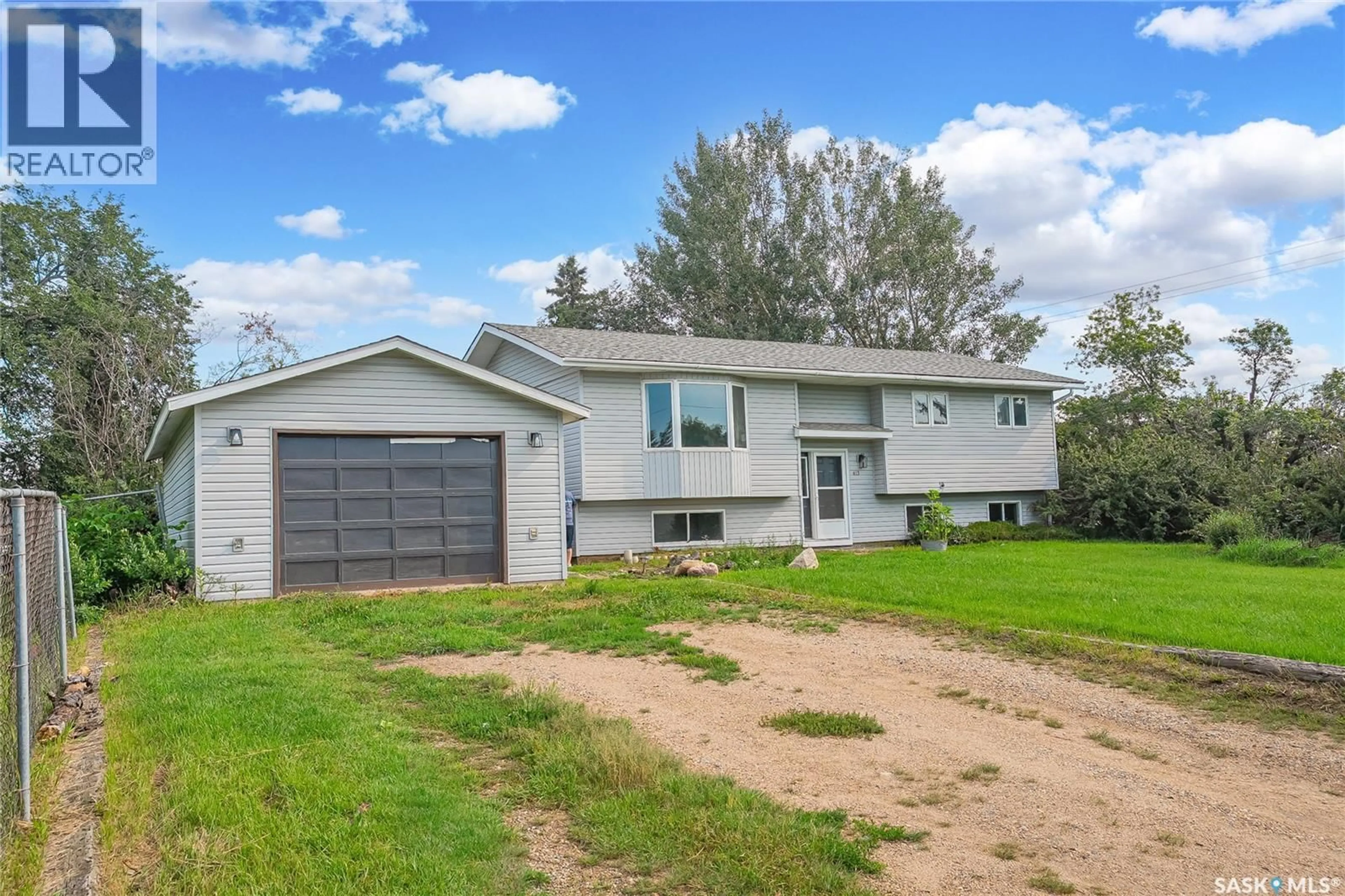 Home with vinyl exterior material, street for 413 1ST STREET, Dalmeny Saskatchewan S0K1E0