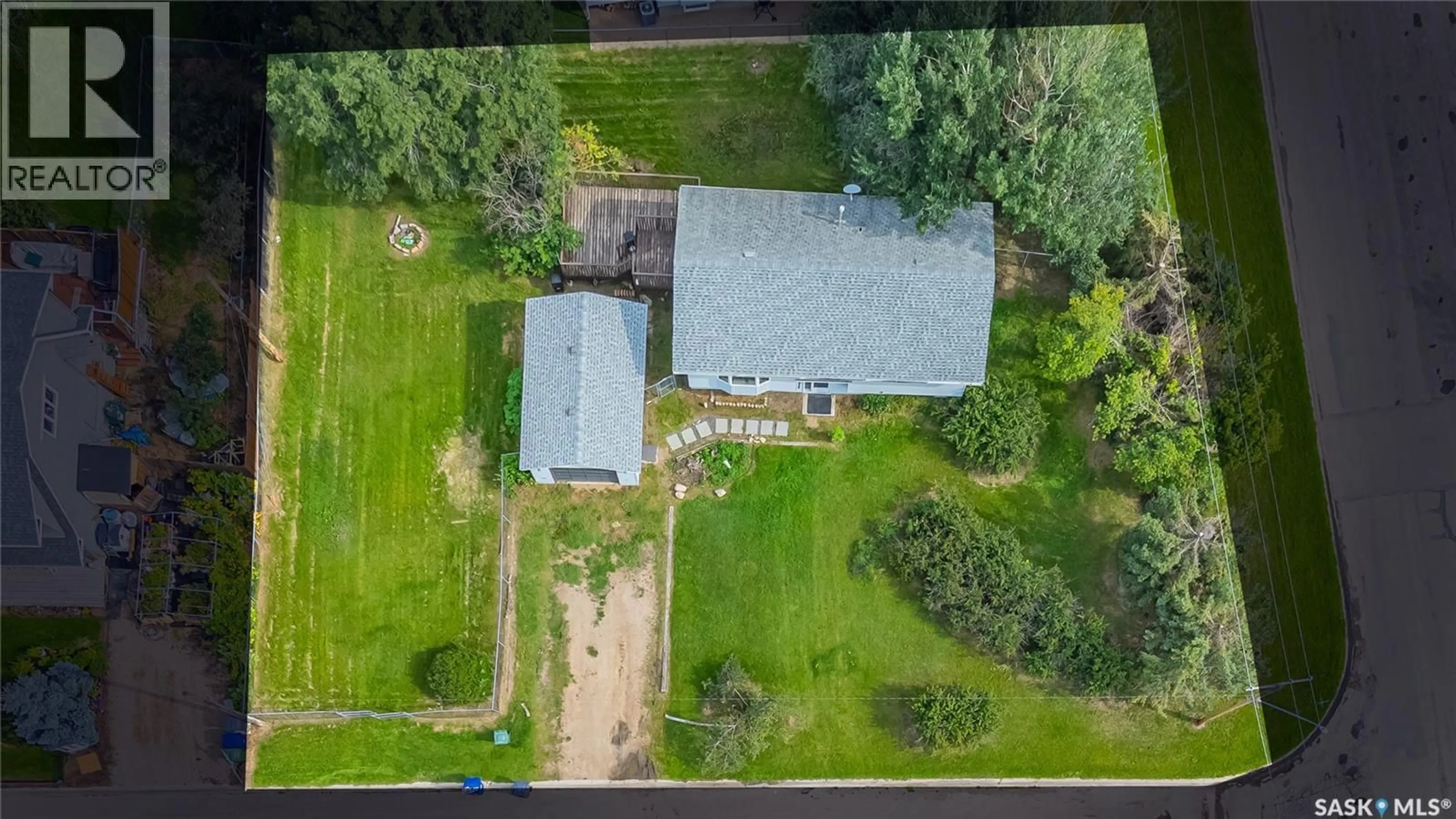 A pic from outside/outdoor area/front of a property/back of a property/a pic from drone, unknown for 413 1ST STREET, Dalmeny Saskatchewan S0K1E0