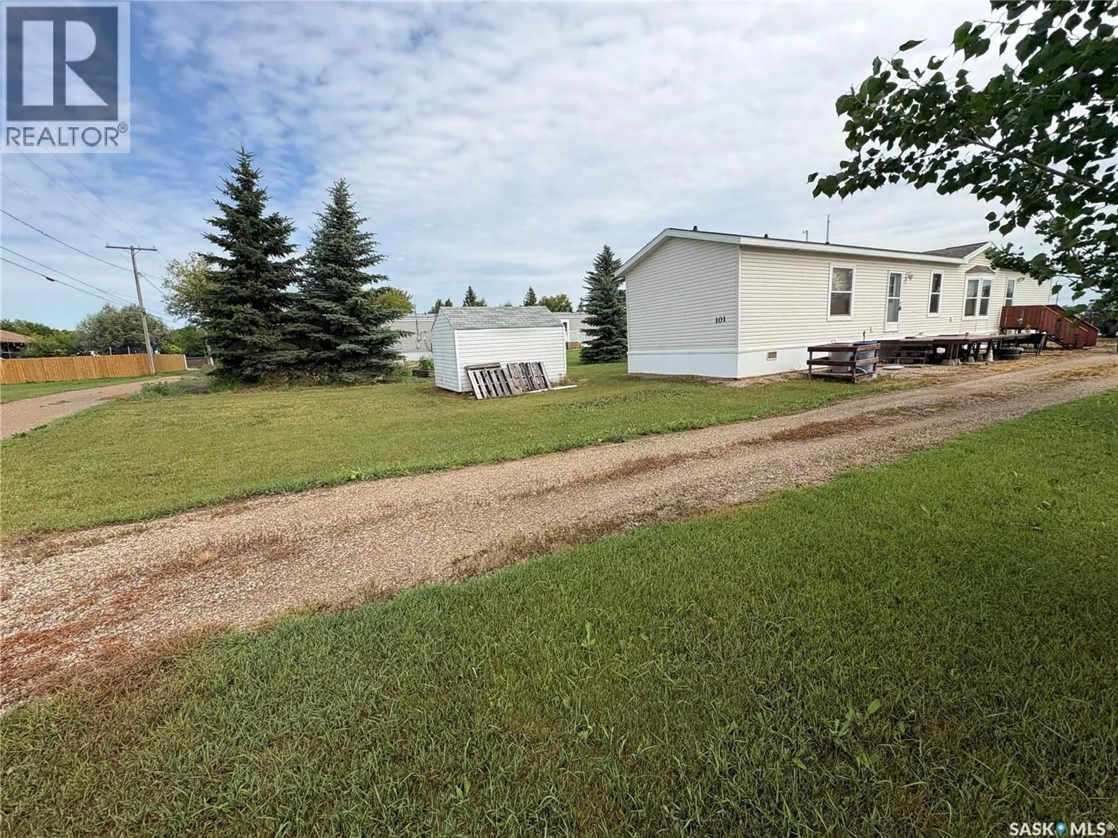 A pic from outside/outdoor area/front of a property/back of a property/a pic from drone, unknown for 101 MONTREAL STREET, Melville Saskatchewan S0A2P0