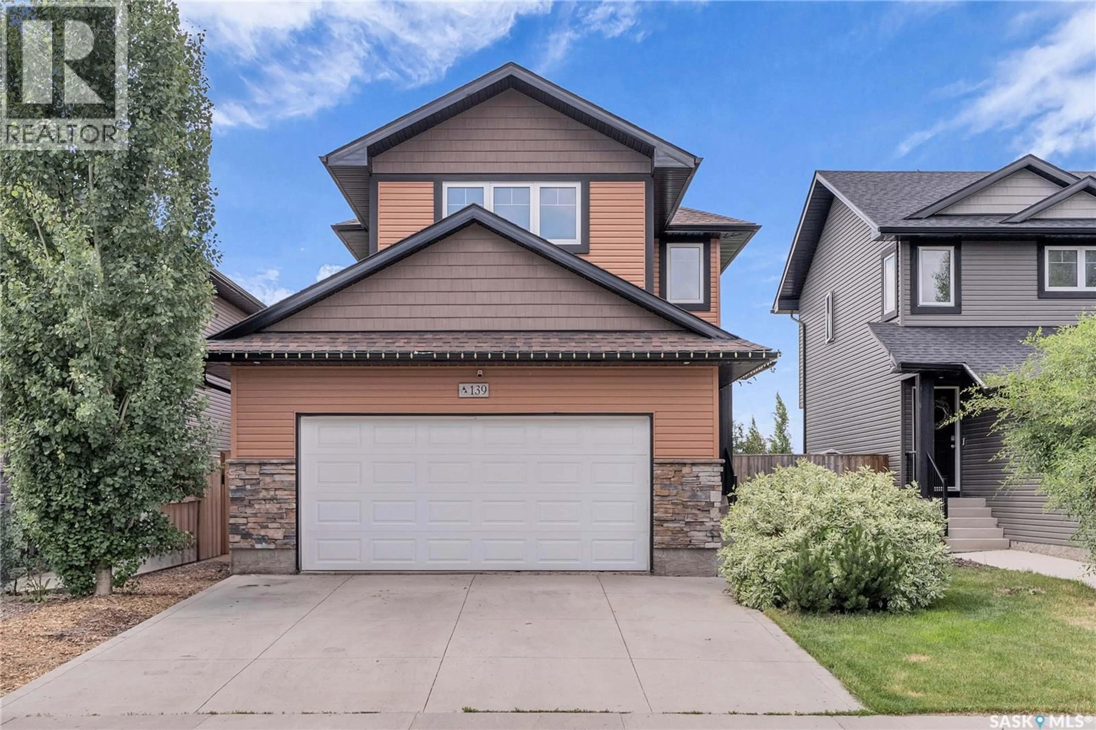Home with brick exterior material, street for 139 CHILDERS CRESCENT, Saskatoon Saskatchewan S7L3G4