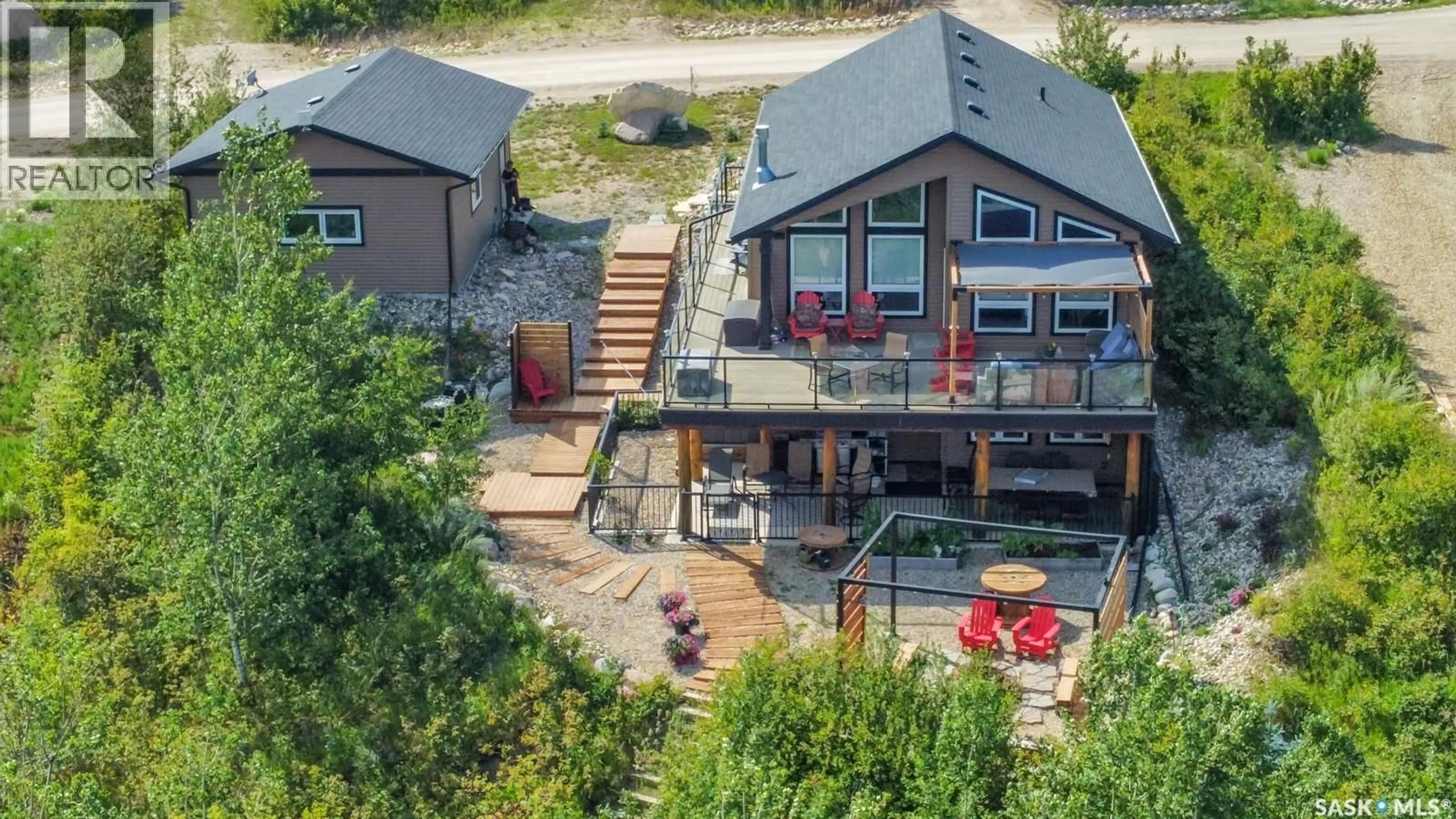 A pic from outside/outdoor area/front of a property/back of a property/a pic from drone, water/lake/river/ocean view for 648 WILLOW POINT WAY, Lake Lenore Rm No. 399 Saskatchewan S0K3V0