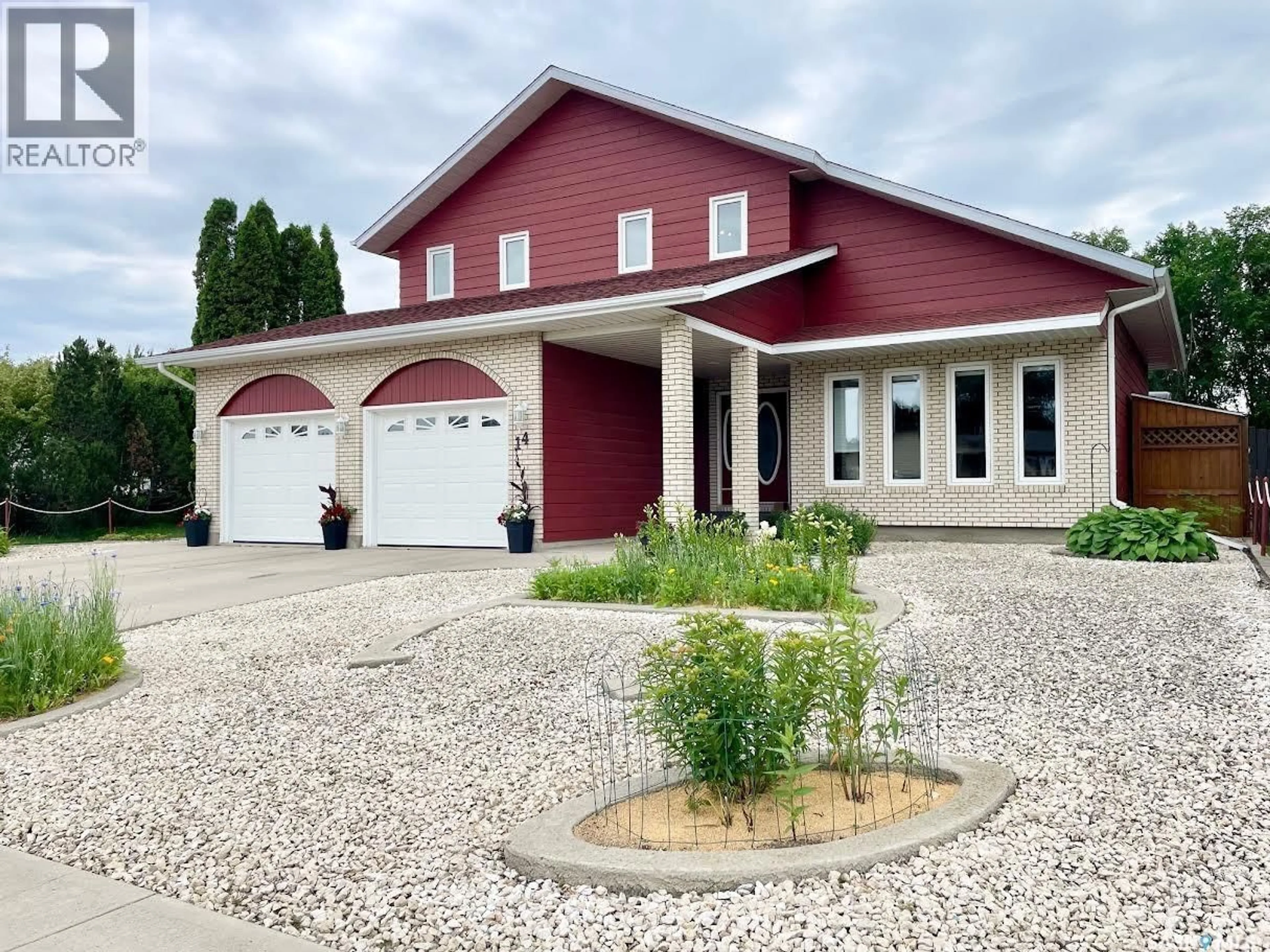 Home with vinyl exterior material, street for 14 MORRISON DRIVE, Yorkton Saskatchewan S3N3X1