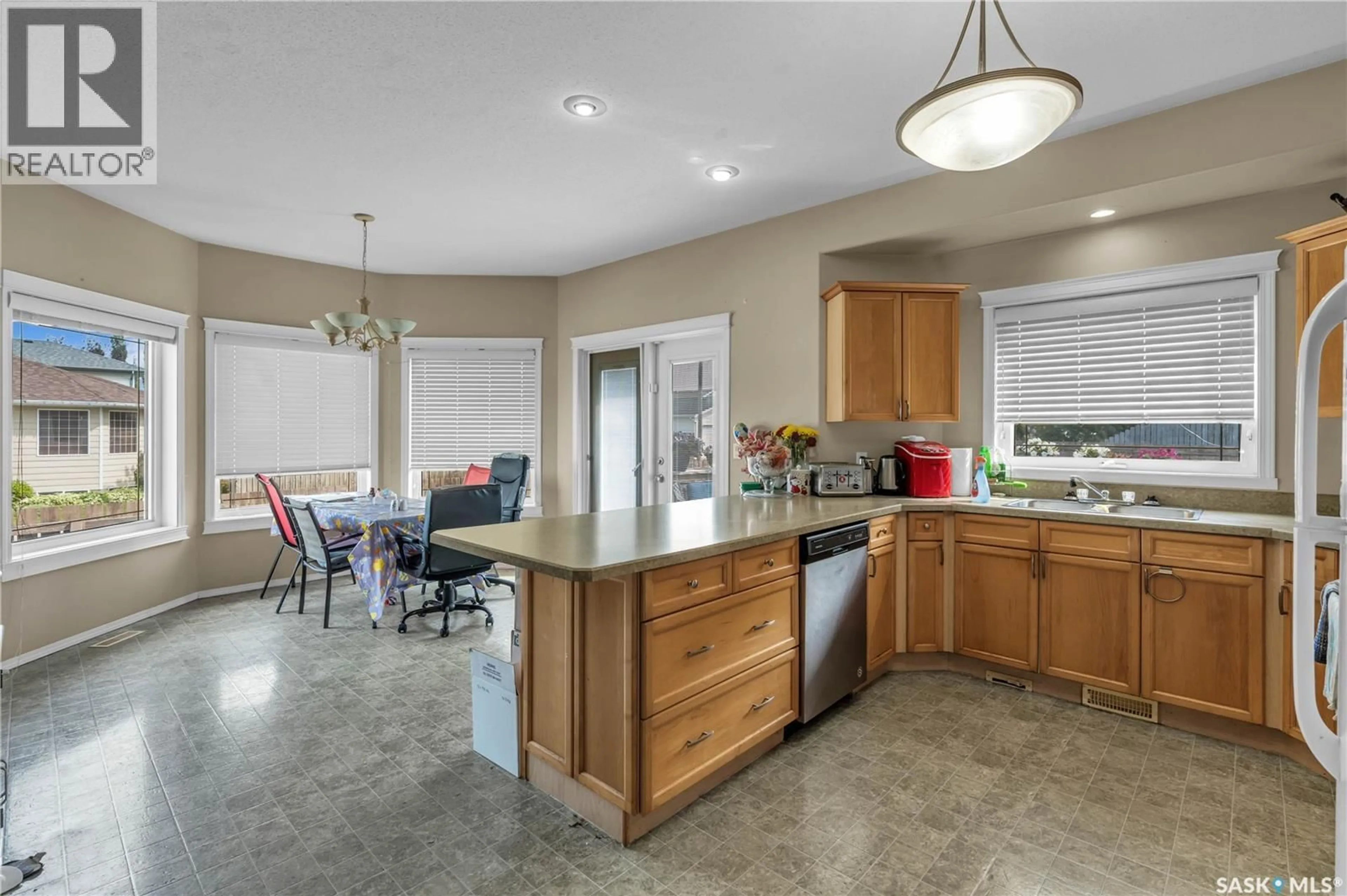 Open concept kitchen, ceramic/tile floor for 319 3RD AVENUE, Martensville Saskatchewan S0K0A2