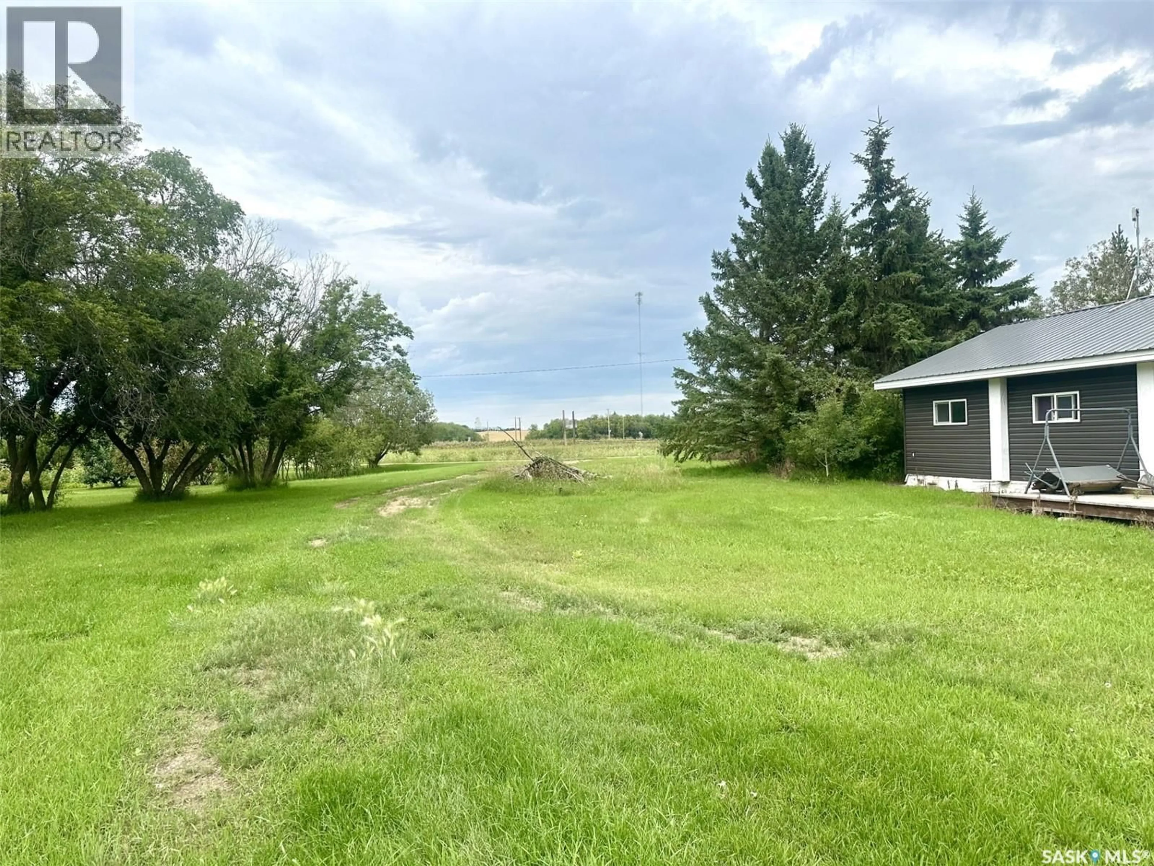 A pic from outside/outdoor area/front of a property/back of a property/a pic from drone, water/lake/river/ocean view for 3 POPLAR STREET, Ruddell Saskatchewan S0M2S0