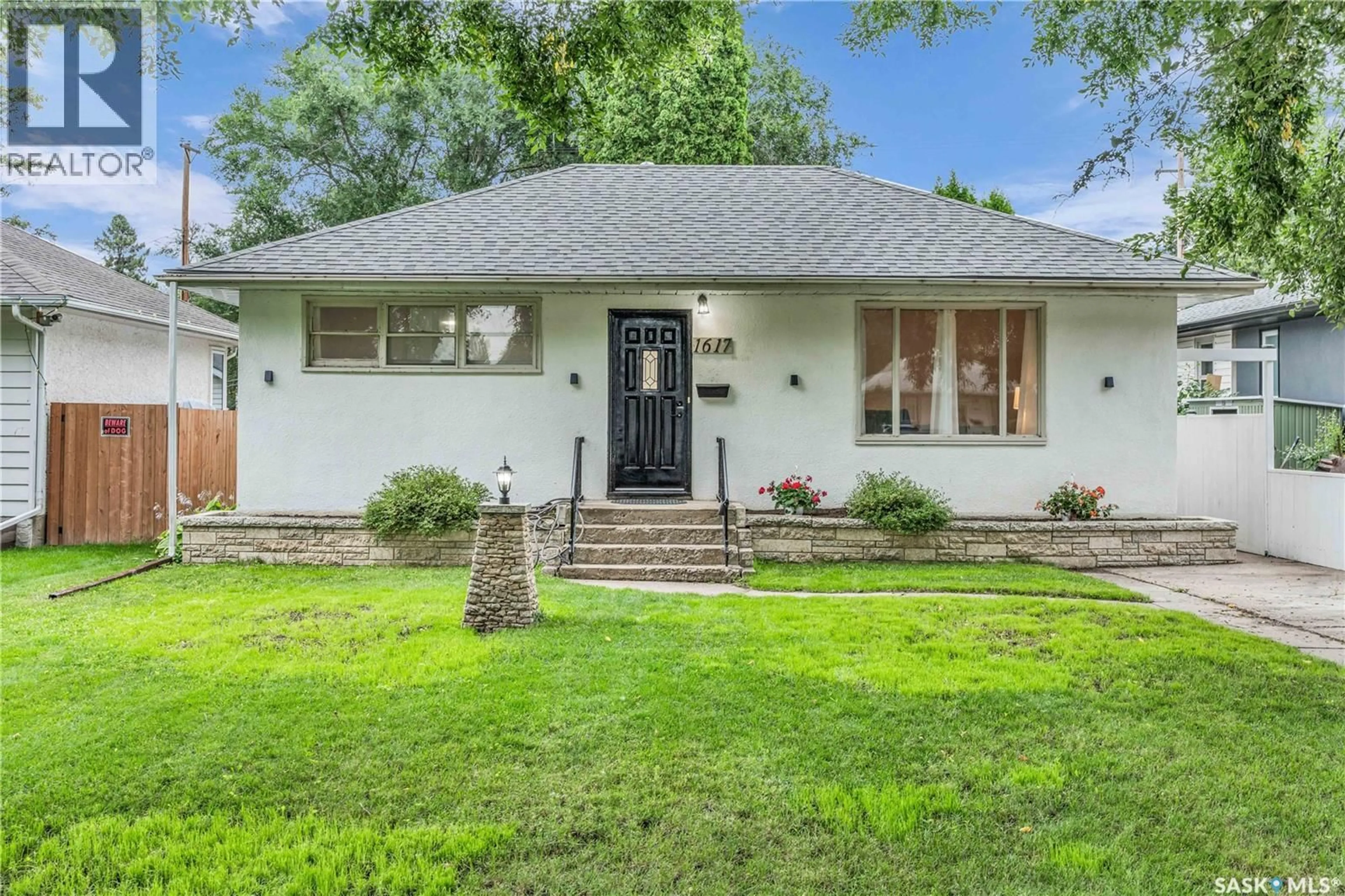 Home with brick exterior material, street for 1617 CAIRNS AVENUE, Saskatoon Saskatchewan S7H2H7