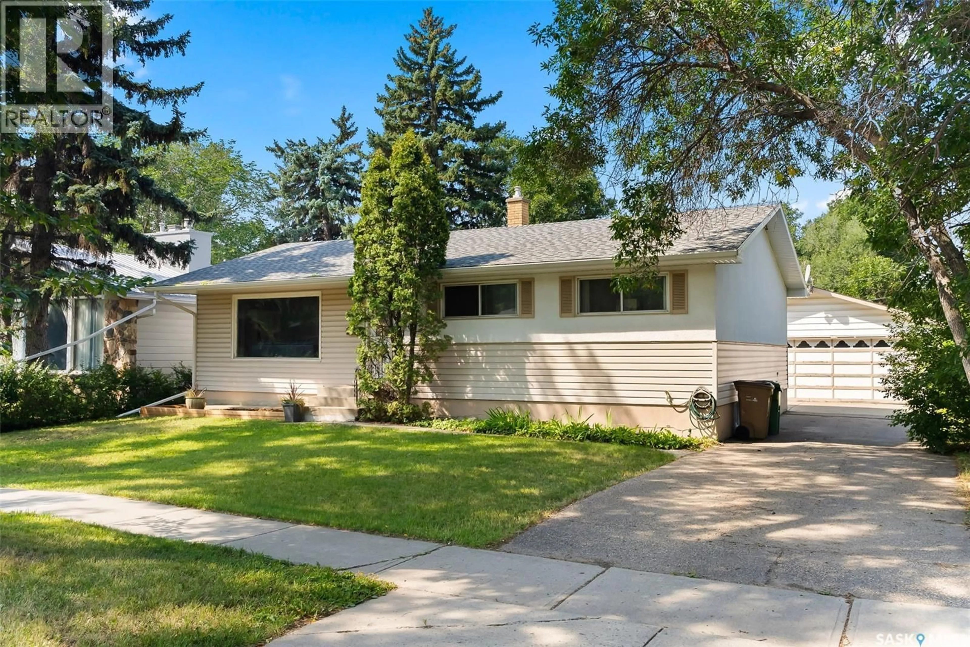 Home with vinyl exterior material, street for 12 MASSEY ROAD, Regina Saskatchewan S4S4M7