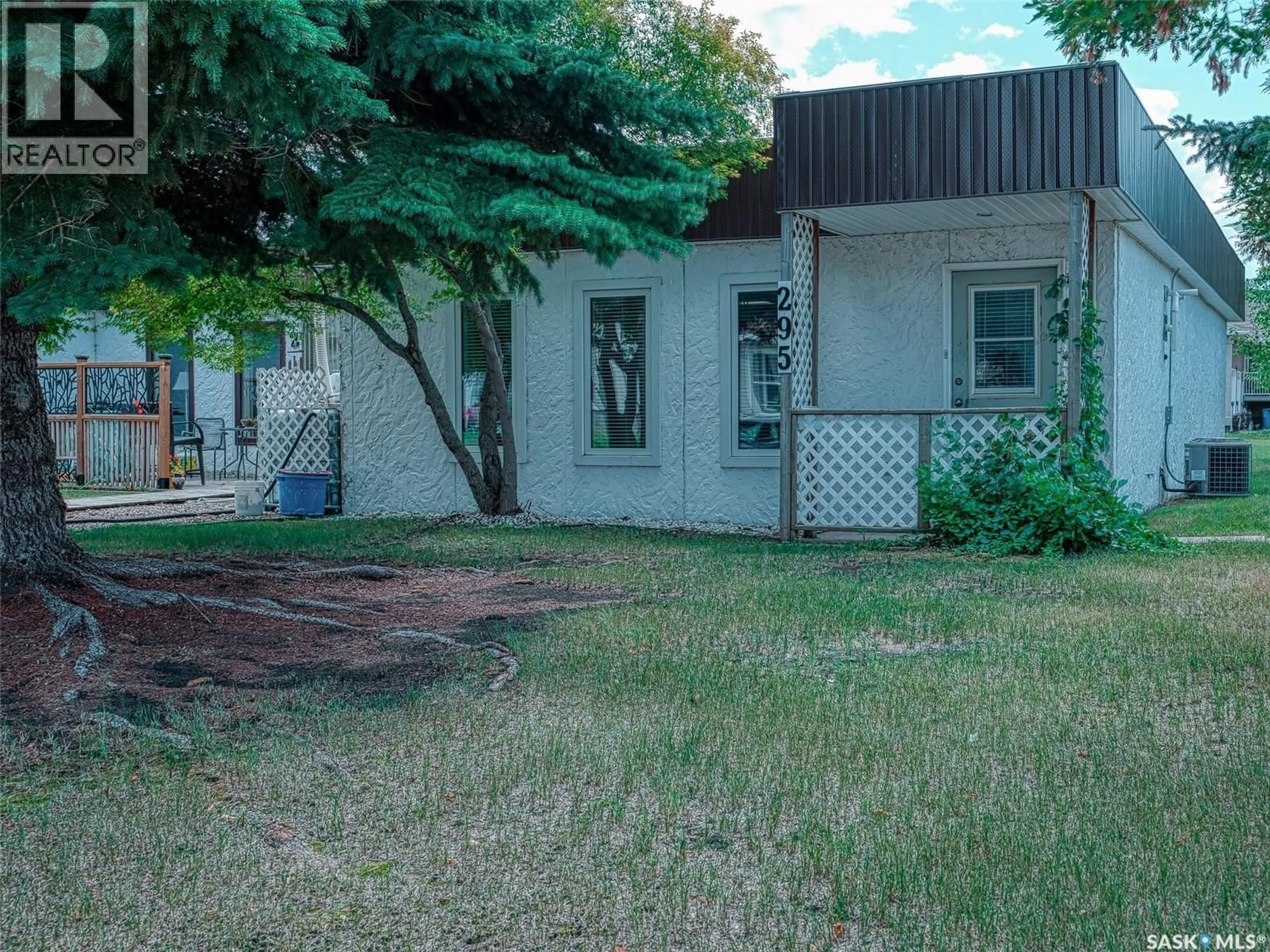A pic from outside/outdoor area/front of a property/back of a property/a pic from drone, unknown for 295 12TH AVENUE, Melville Saskatchewan S0A2P0