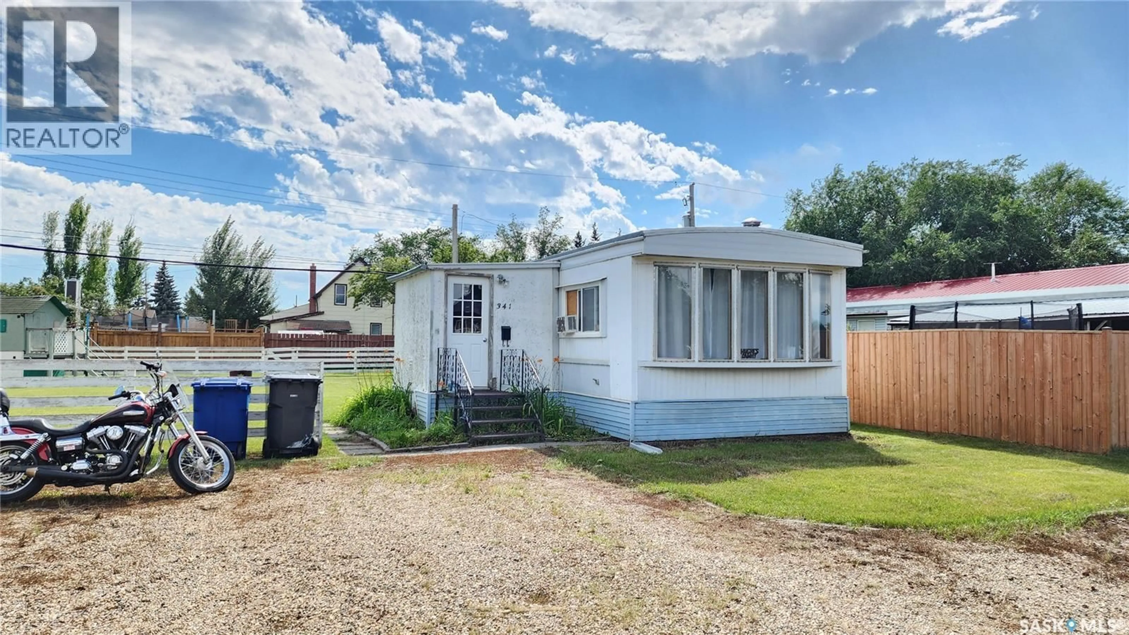 Home with vinyl exterior material, street for 341 30TH STREET, Battleford Saskatchewan S0M0E0